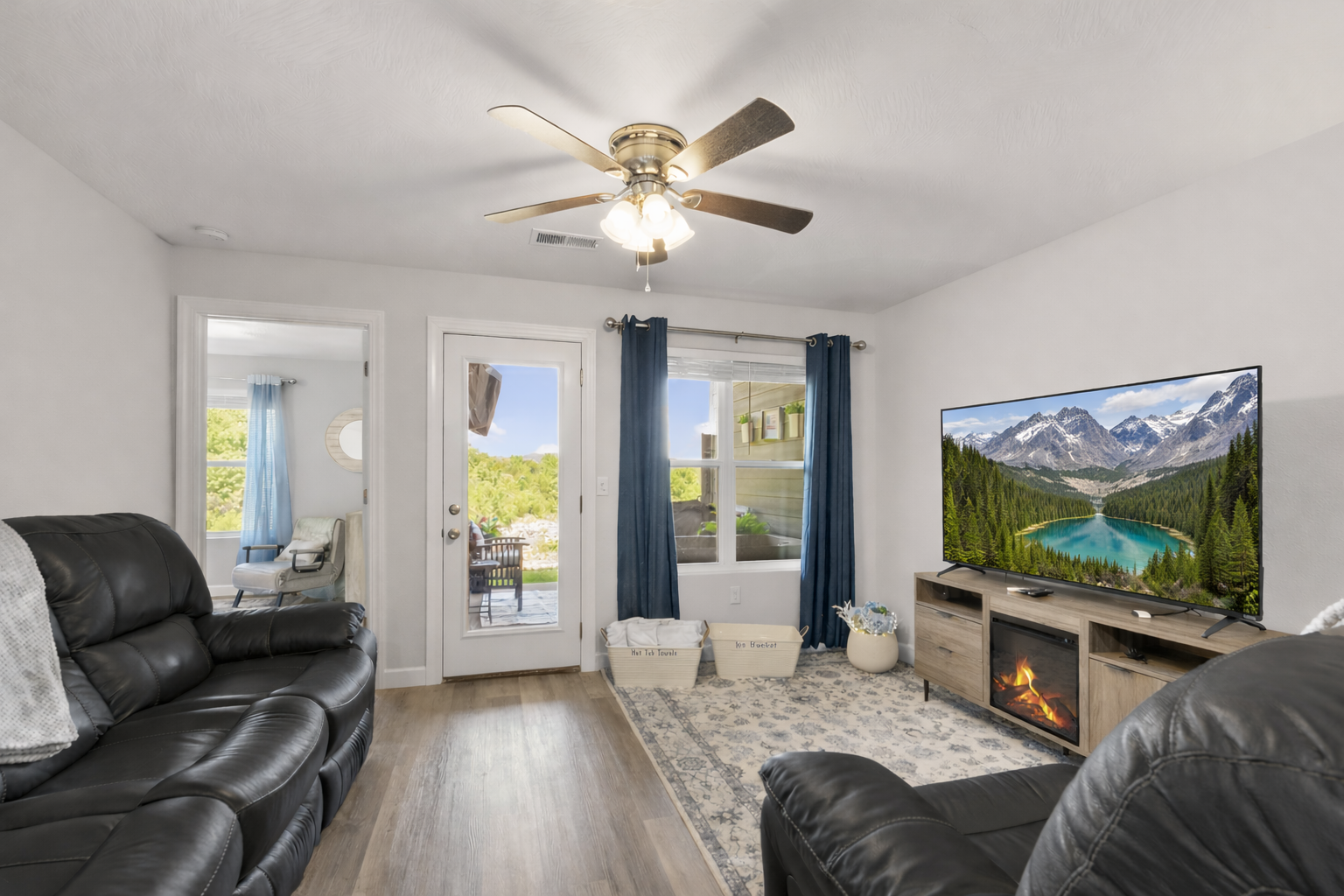 Leave the cares behind as you unwind in this cozy, bright living room. Spacious with breathtaking views of the mountains. Step outside onto your private patio and enjoy your personal hot tub to end the perfect day.