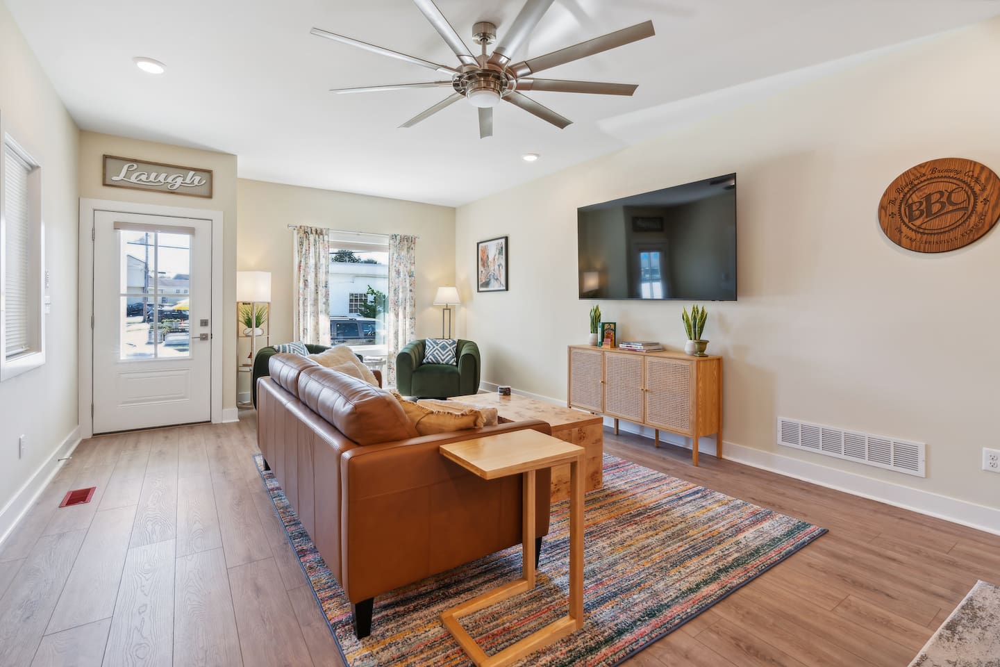 Relax in the large, open living room -watch the 75in smart TV and surf the net in comfort!