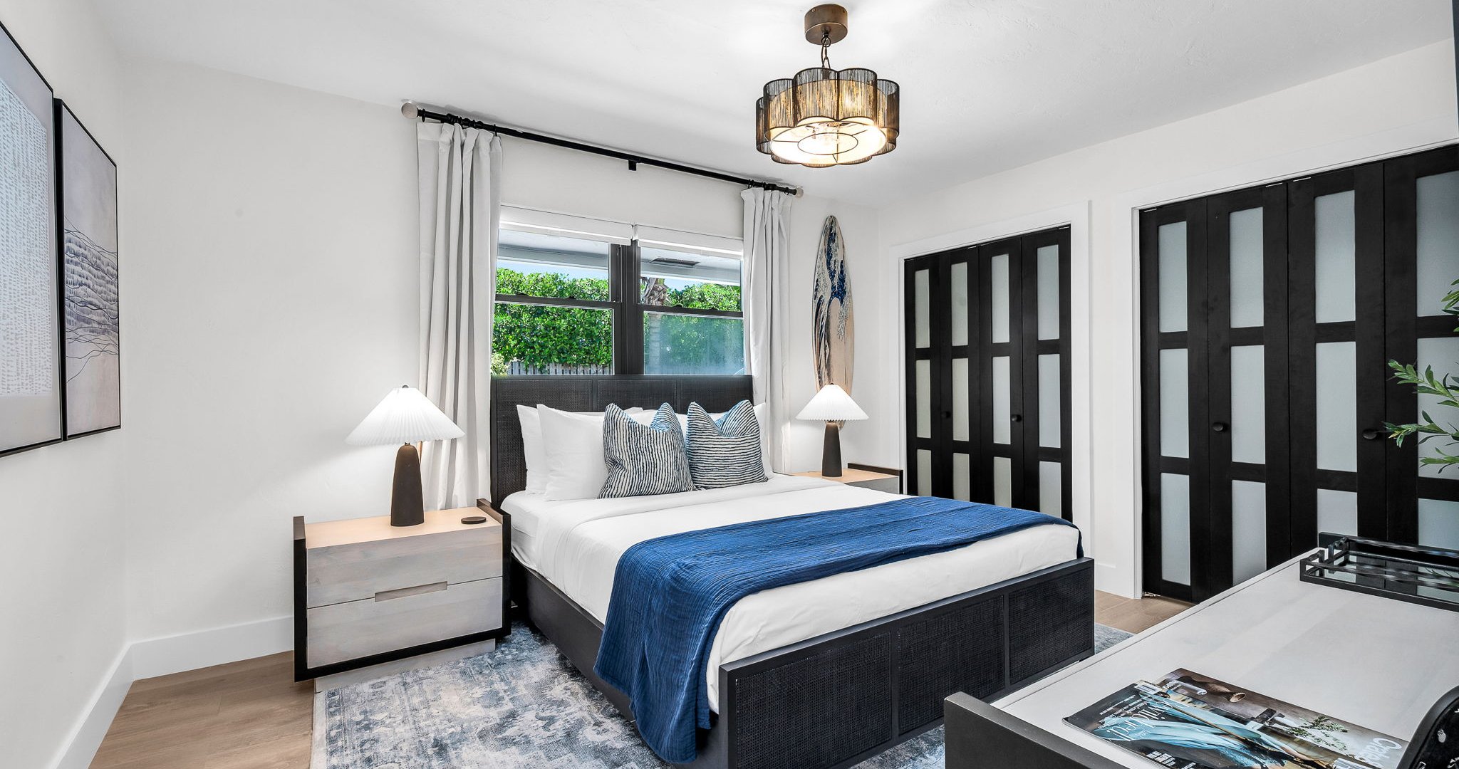 Designed for both style and comfort, this queen retreat blends chic coastal décor with sleek modern touches. With loads of closet space and a Smart TV for streaming, it’s perfect for unwinding after a day at the beach.