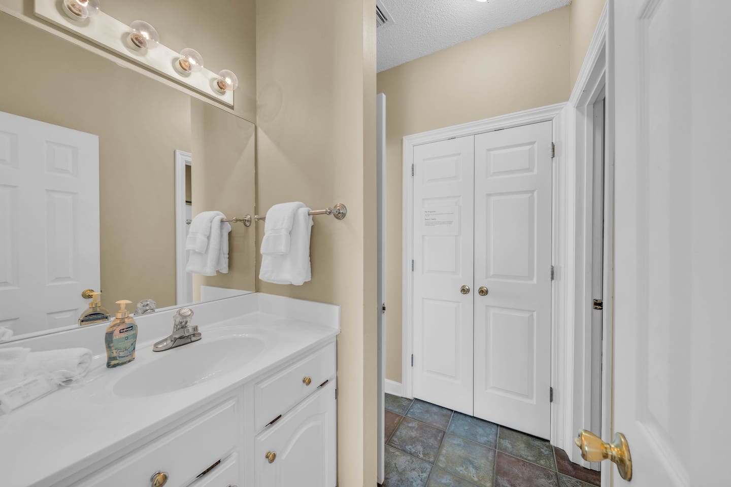 West front bathroom, access to both front queen bedroom and living room
