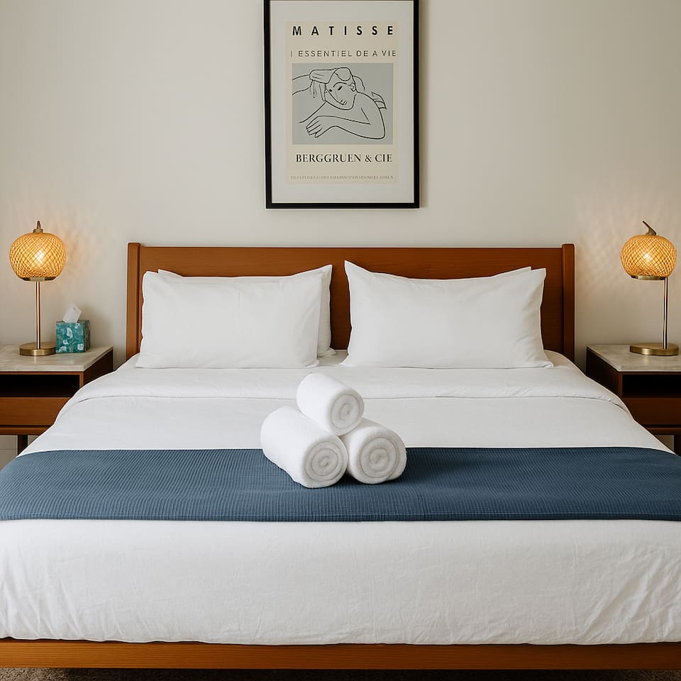 Bright, comfortable king bedroom with hotel-level comfort and peaceful rest.