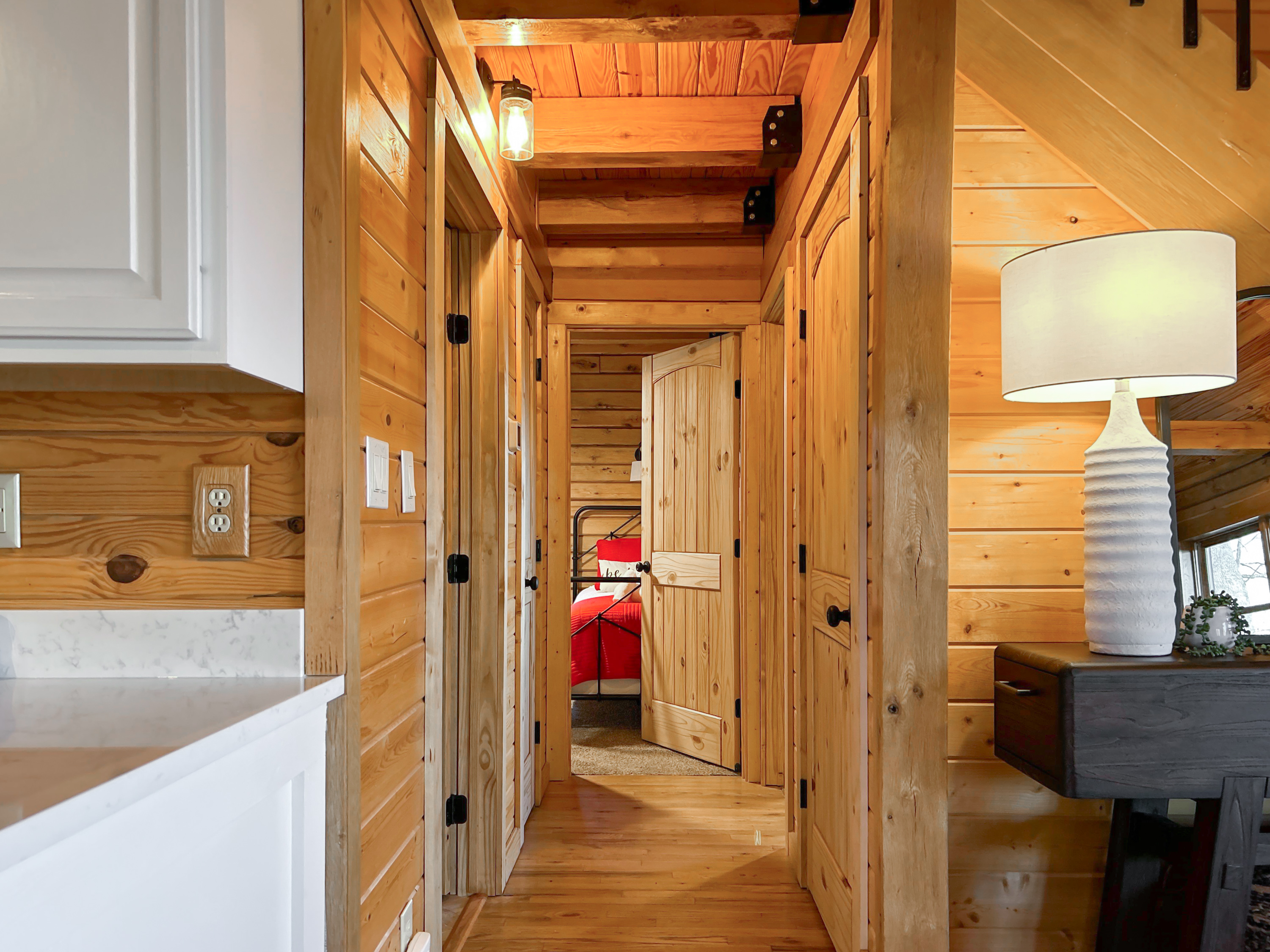 The two downstairs bedrooms are down the hallway off of the entryway & kitchen.