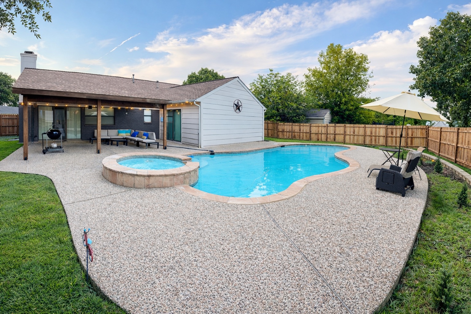 The pool & Spa area boasts spacious backyard, outdoor furnitures, grill and seating area.