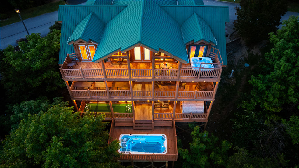 Surrounded by forest and fresh mountain air, the swim spa offers a peaceful retreat where relaxation meets the natural beauty of the Smokies.