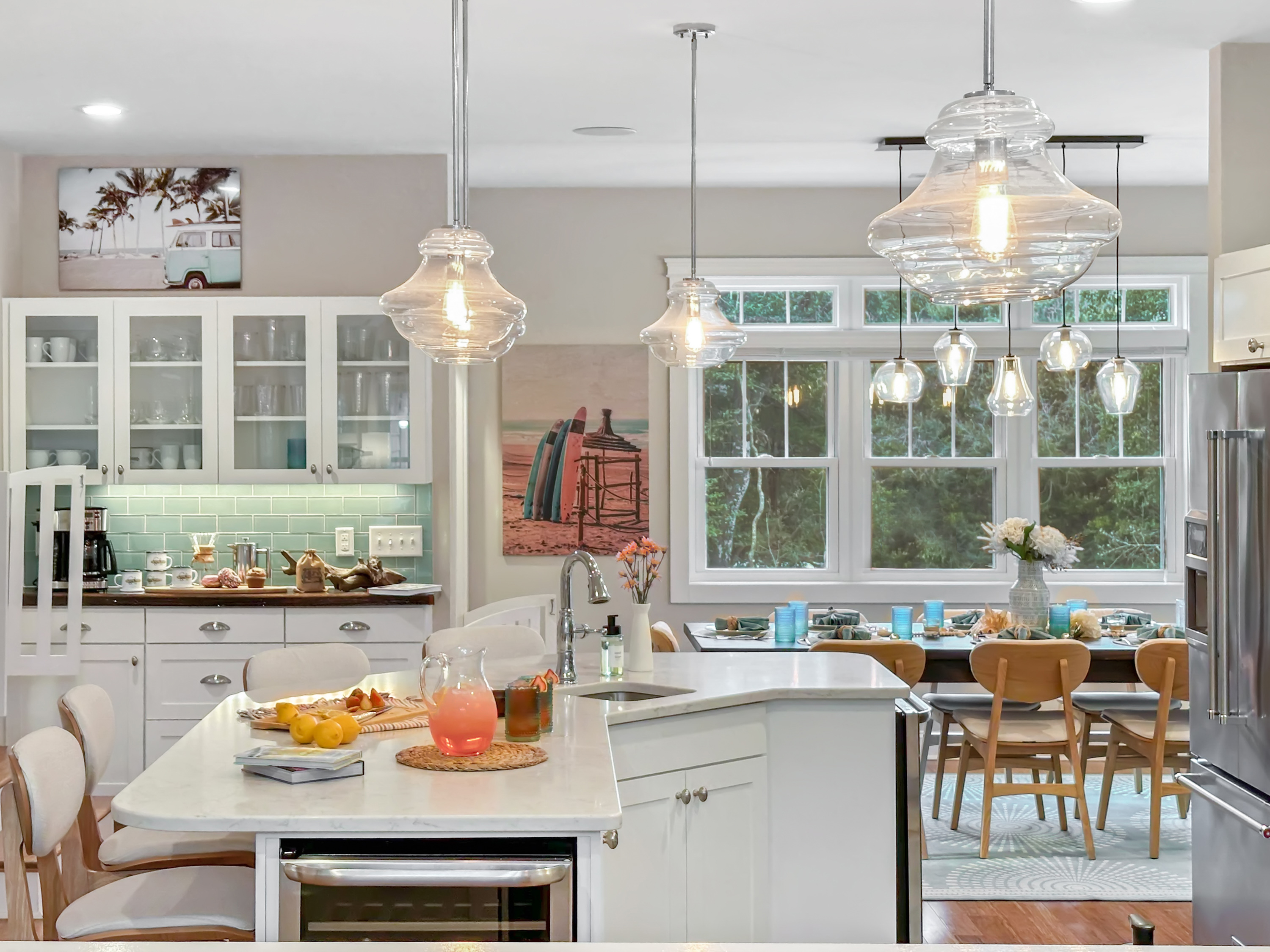 Beyond the Kitchen are the coffee station and the formal dining area.