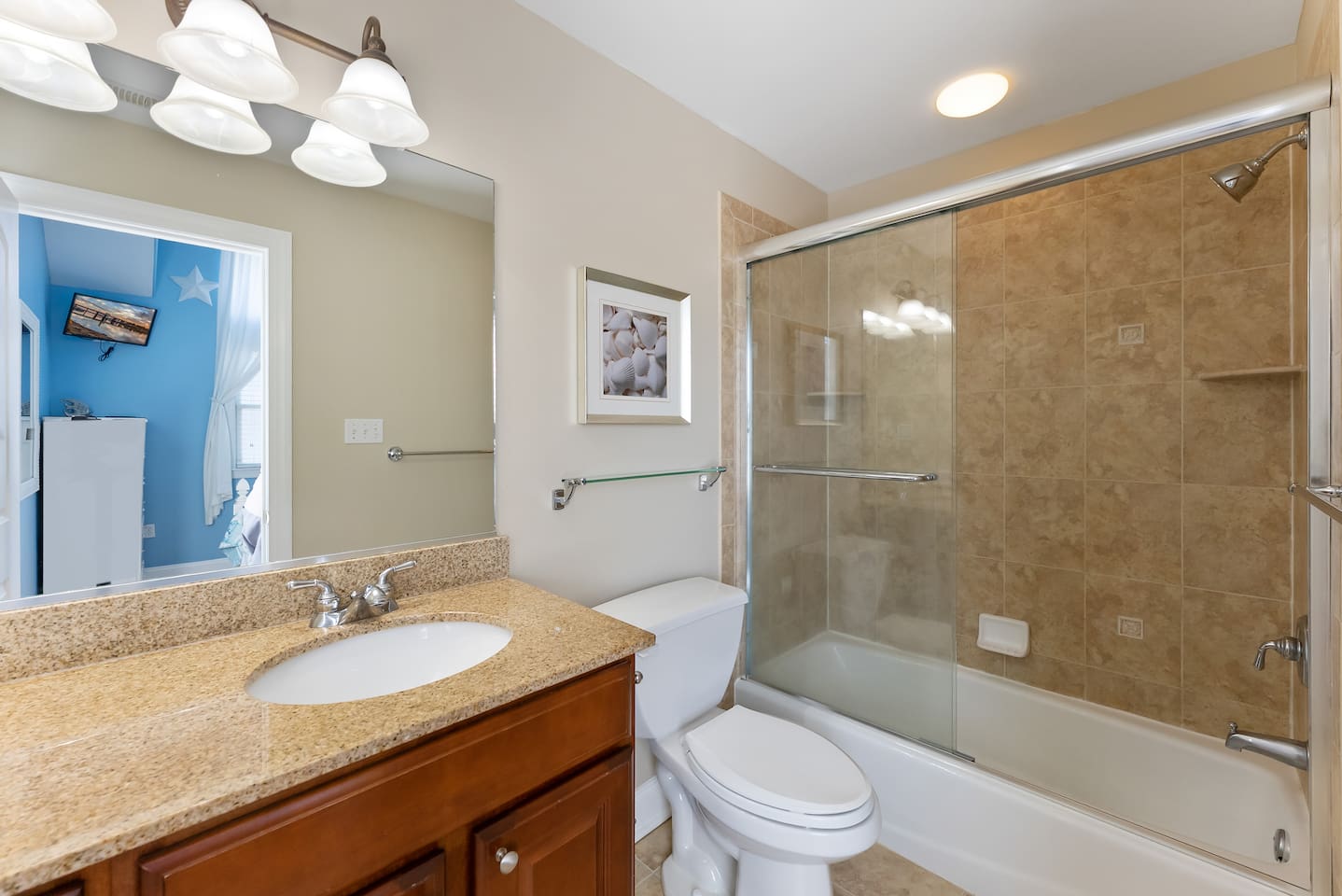 Full private bath with large vanity, tub and shower. 