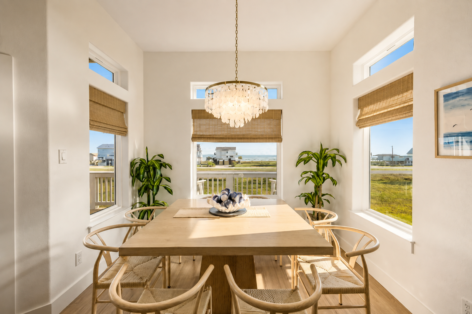Enjoy delicious meals at the table seating 8 watching the waves crash.
