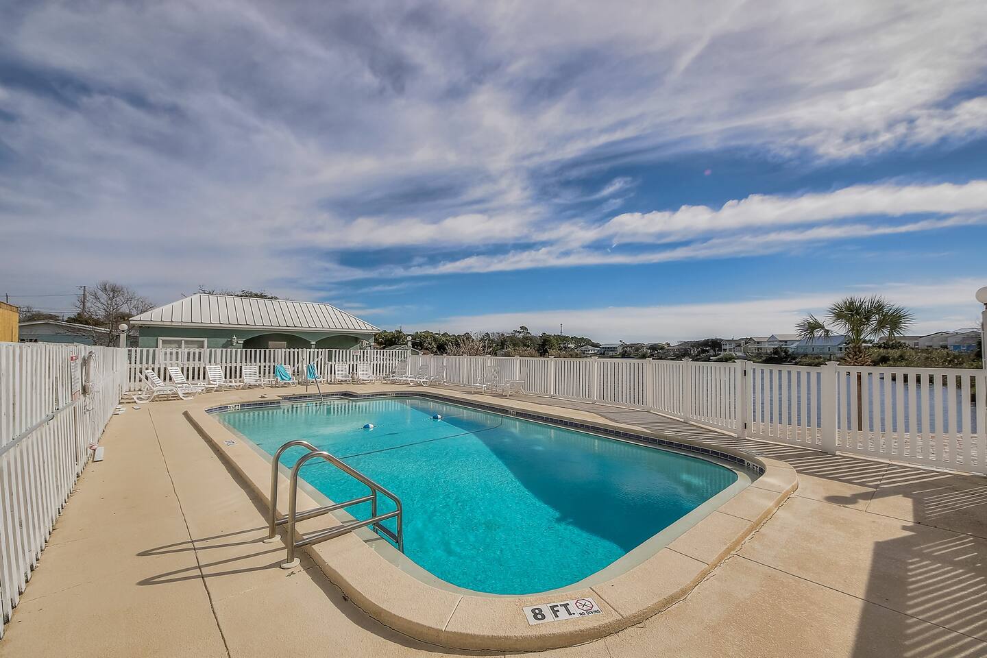 Need a break from the beach? Come and unwind in the community pool overlooking the lake.