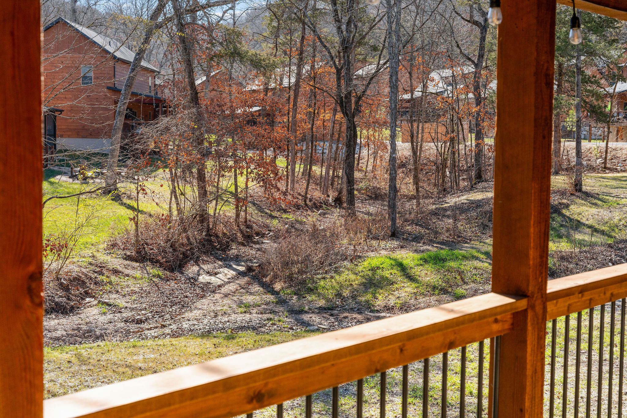 Peaceful wooded surroundings offering a quiet, natural backdrop with a creek bubbling through.