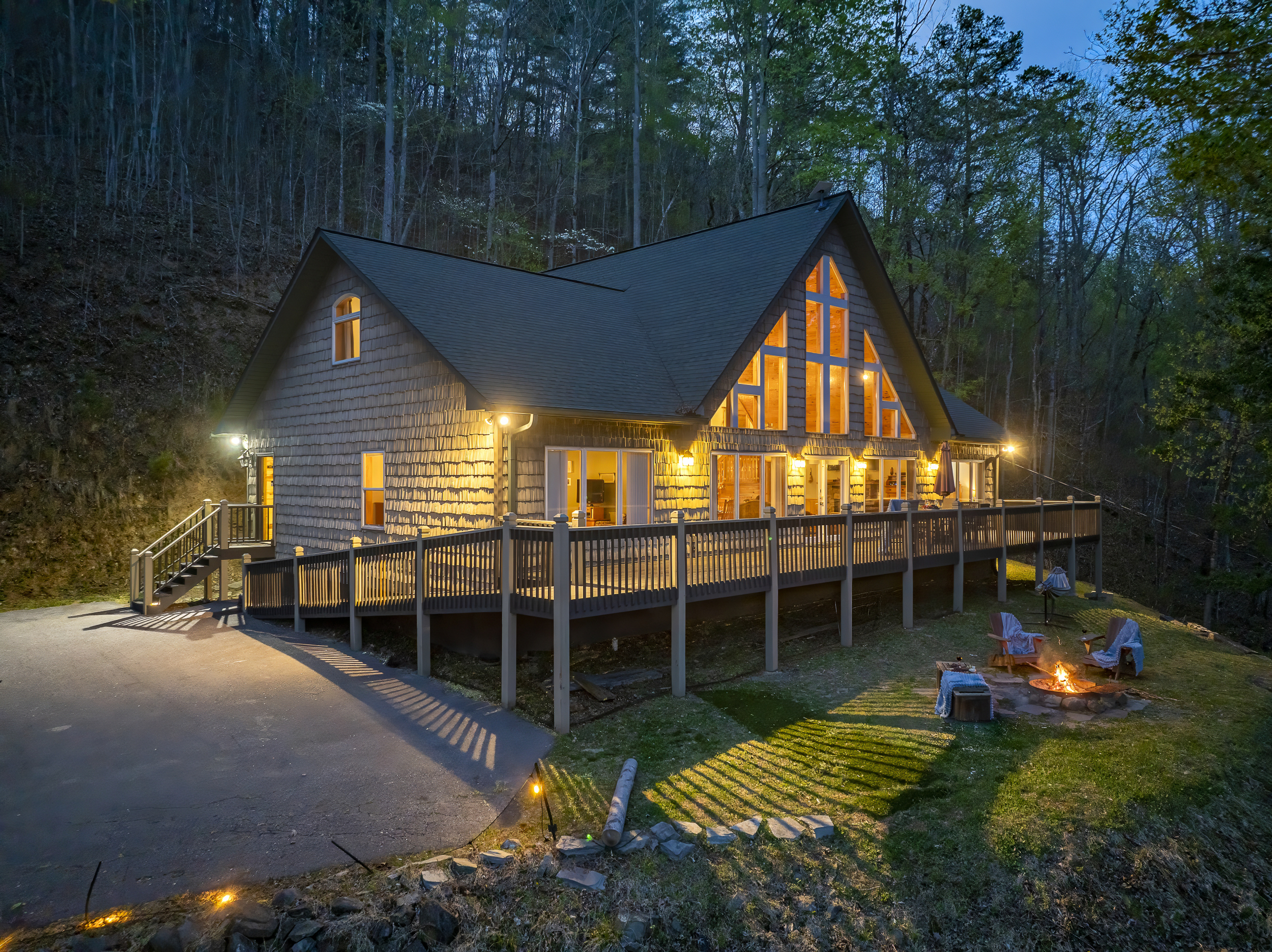 Exterior Oasis: Experience warmth and charm with stunning views and inviting outdoor firepit!
