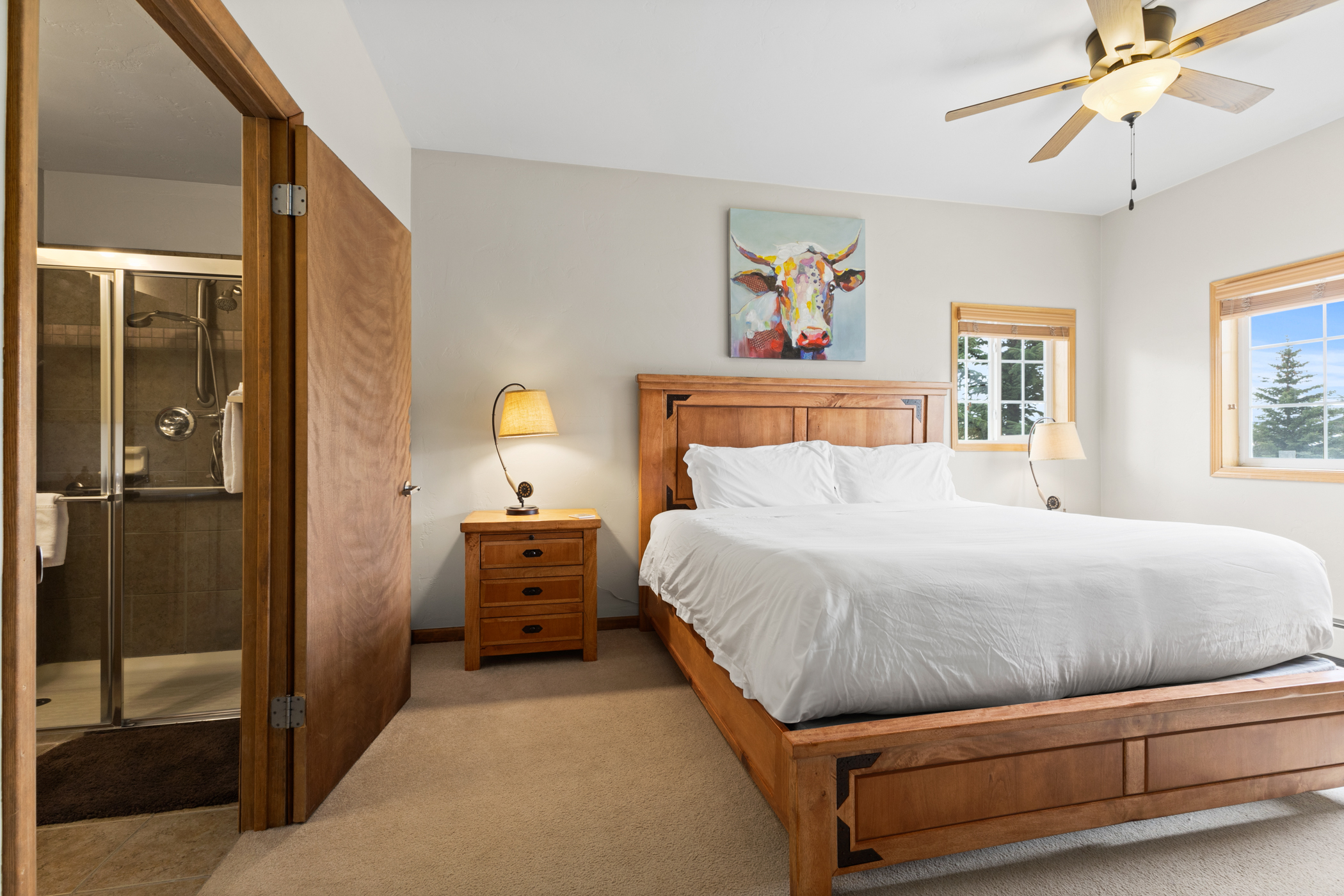 Ensuite King Bedroom 1 with Bathroom in background