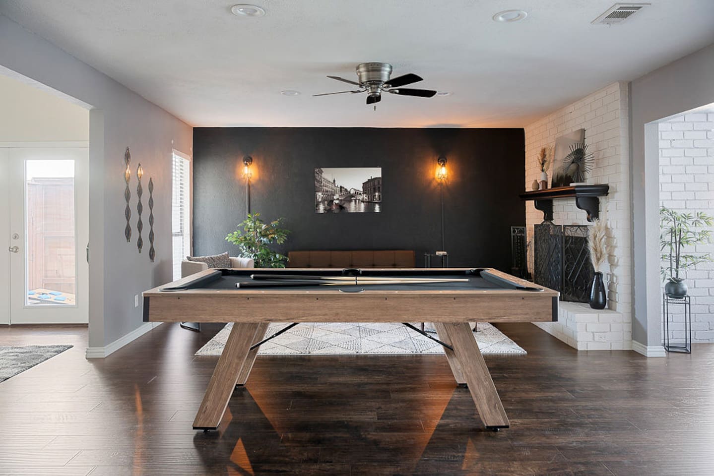 Have some fun with this chic, fully-equipped pool table during your stay. Your group can enjoy conversation amidst the game with the open-concept seating area next to the pool table. There is also an exercise station with yoga mats for your use!