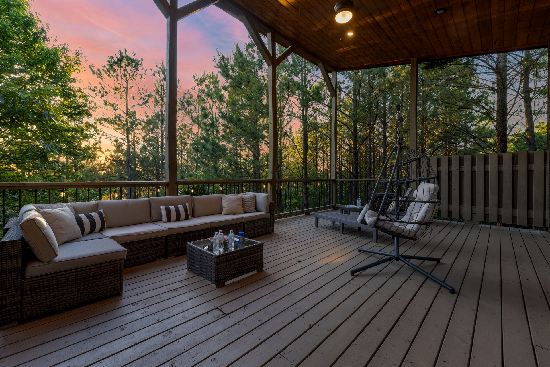 An inviting outdoor patio with comfortable seating and TV, ideal for chill evenings and casual hangouts. 🌙