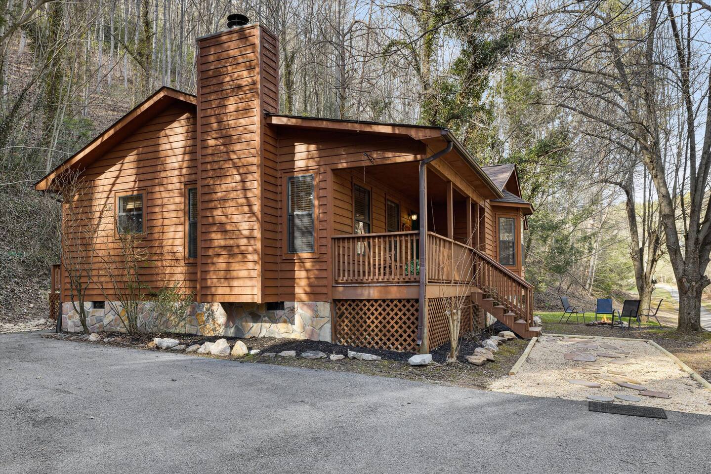 Driveway / Parking - This parking area is flat and has room for up to 3 vehicles. The driveway is steep but not unmanageable. 