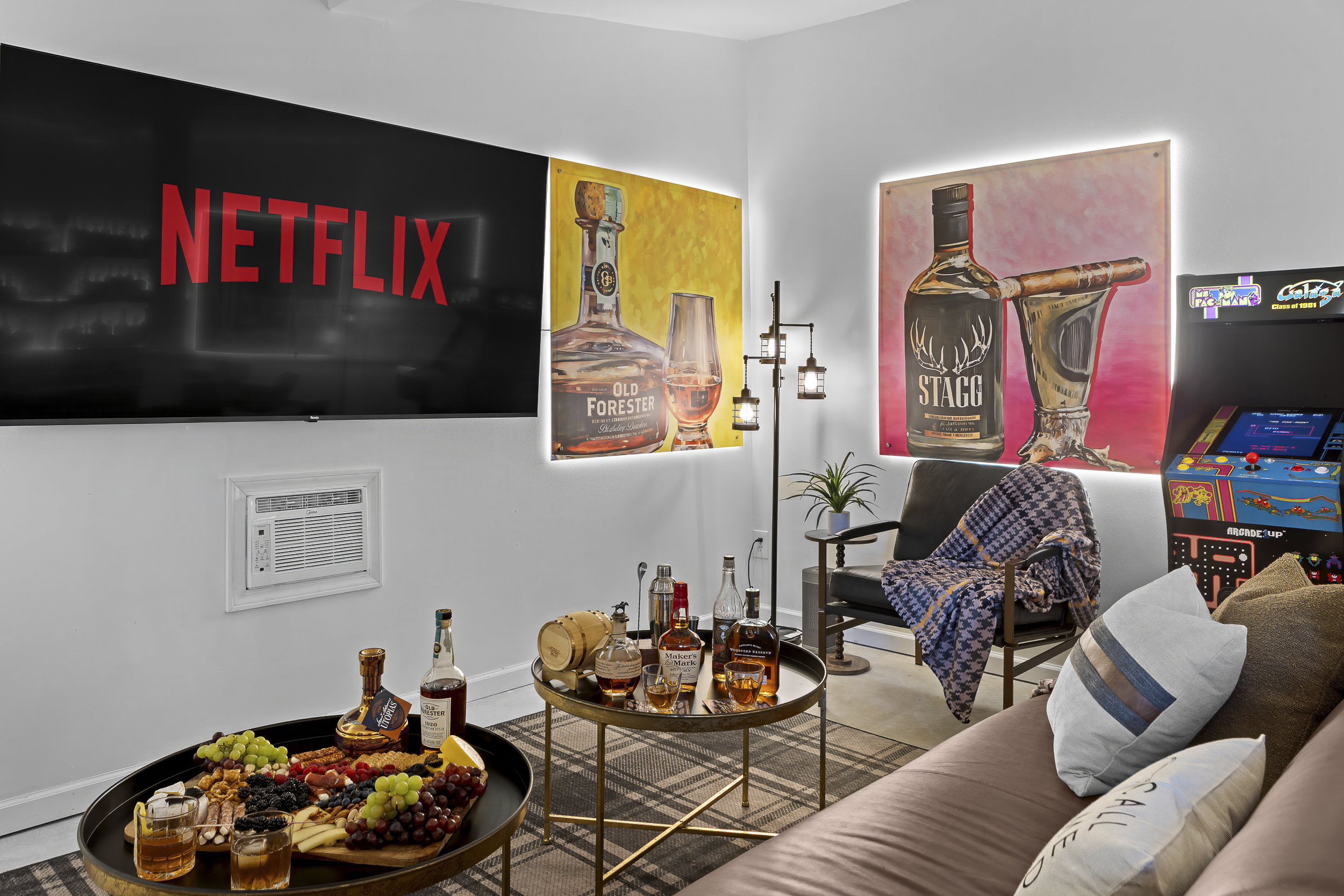 Catch the game or fire up a movie on the smart TV, surrounded by Old Forester art and serious bourbon energy.