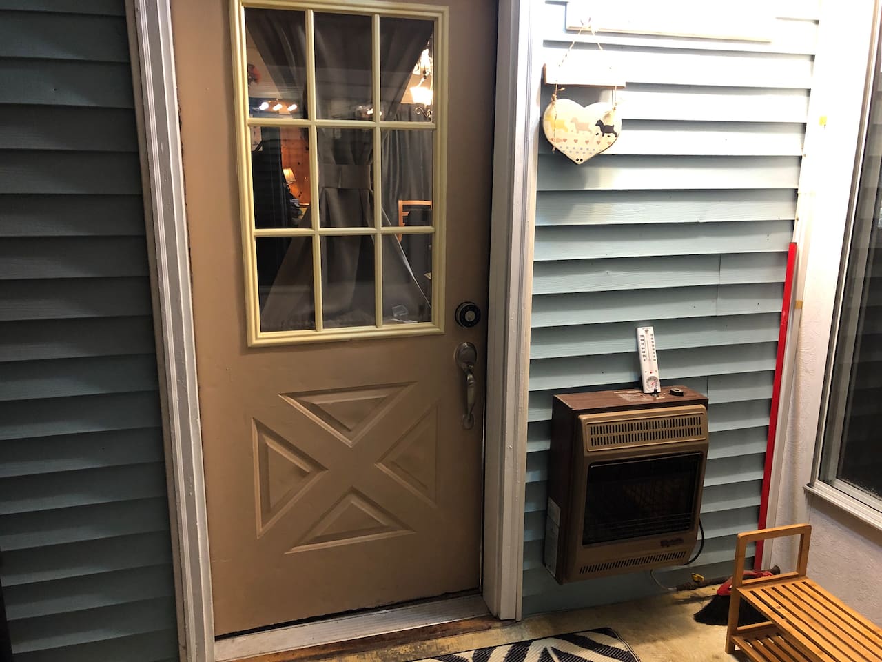 Main code-access door. Space heater is not usable and not in working order.