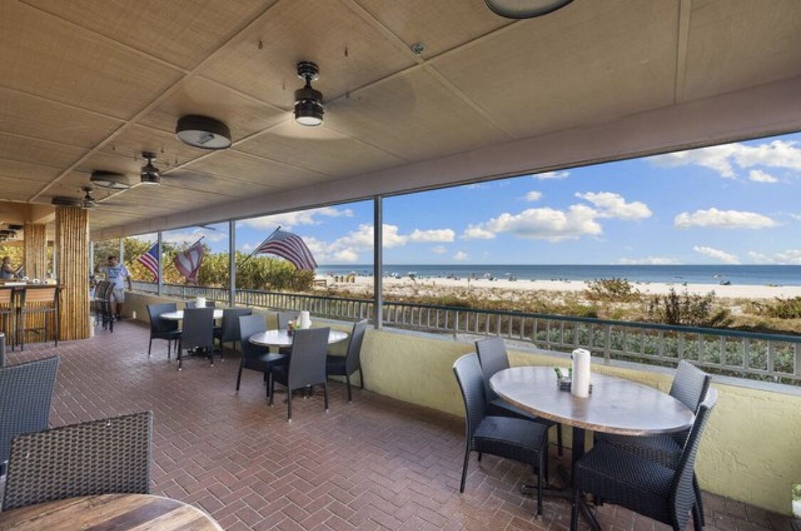 The ONLY weekly beachfront condo rental that has a restaurant in the building