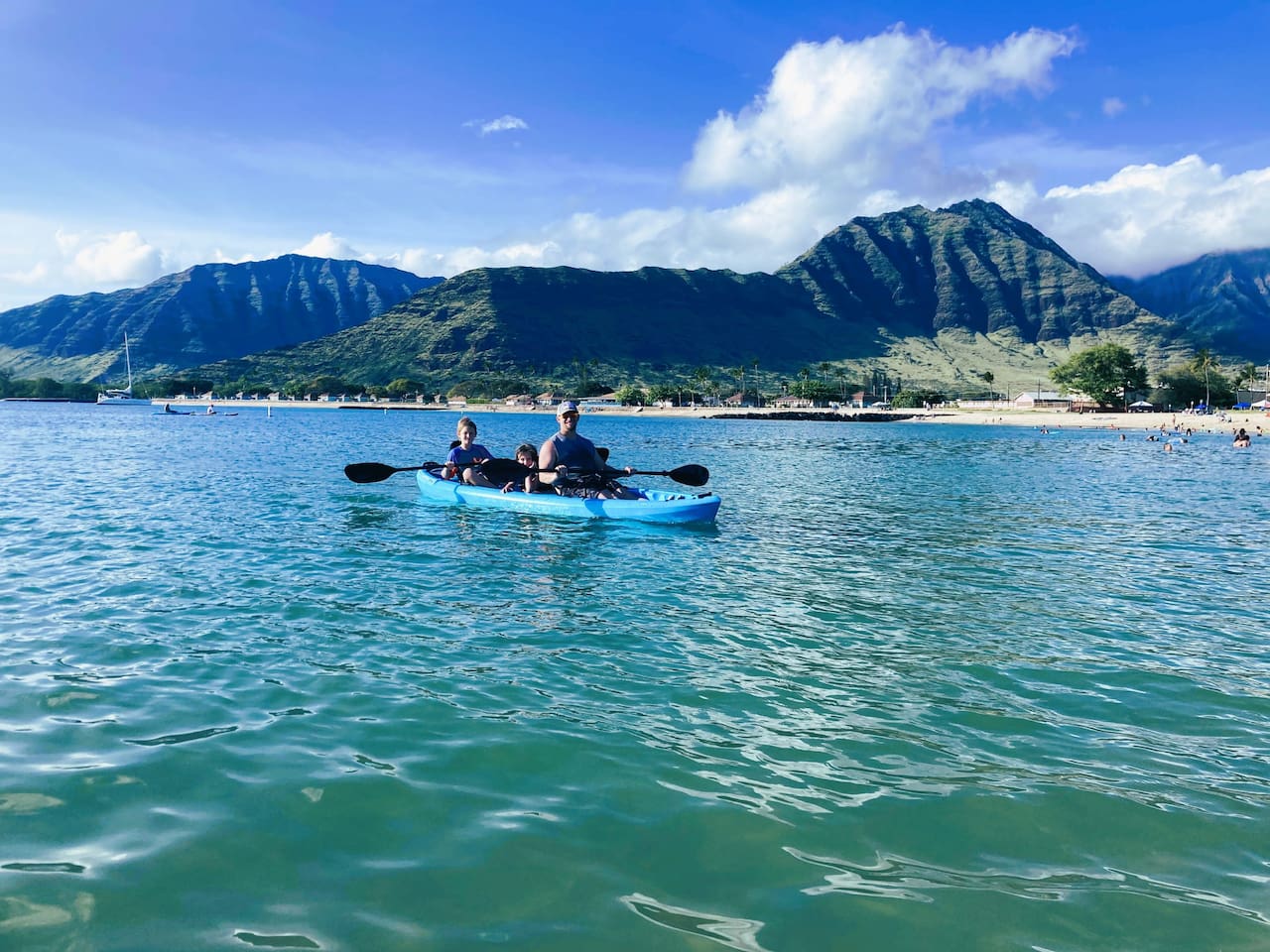 Kayaking by Jurassic Park movie's mountains in one of the 3 two-person kayaks in the home
