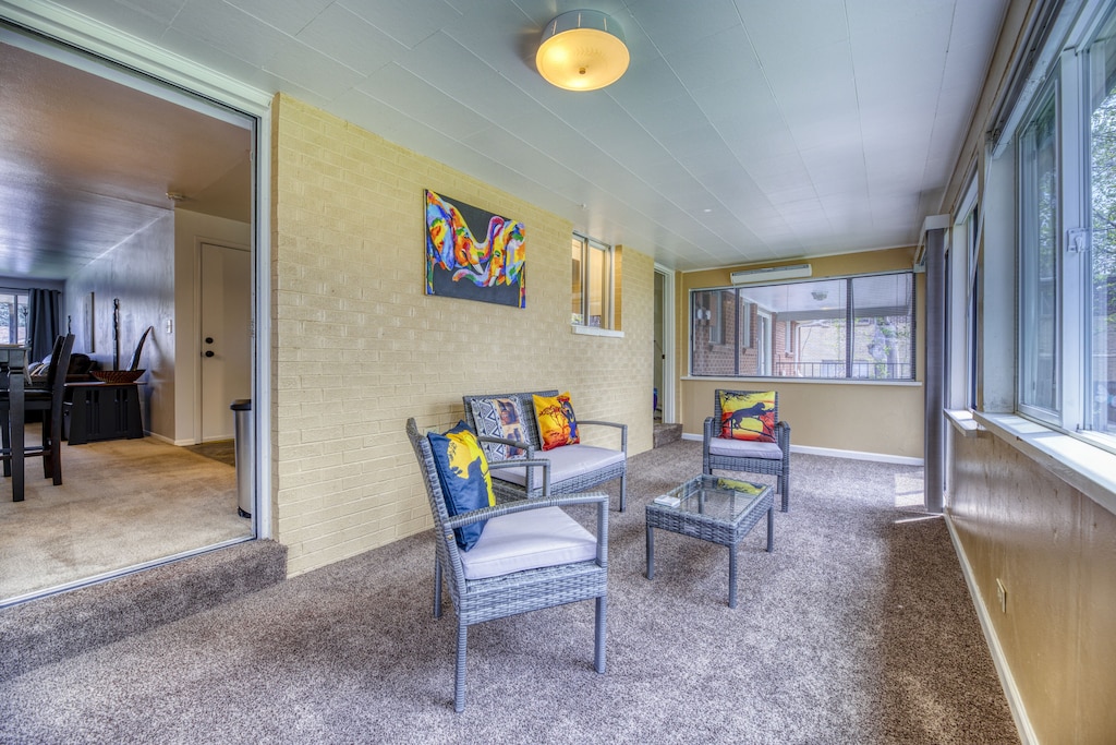 Right outside the dining room is your own private sunroom.