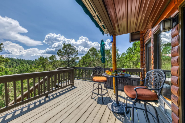 Enjoy your morning coffee or evening drink on the patio, complete with tables and chairs and surrounded by peaceful nature views.