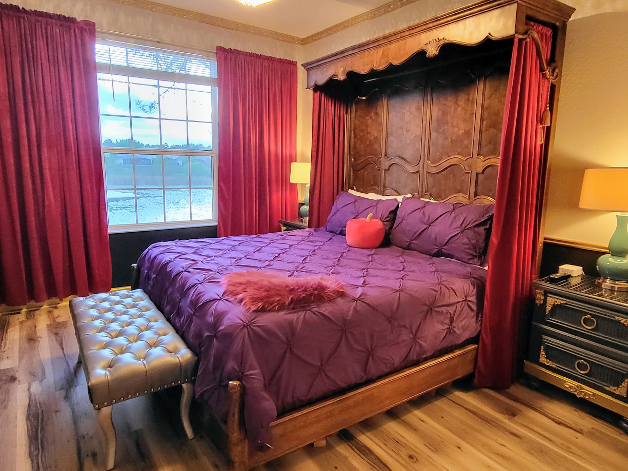 The Evil Queen’s Royal Suite, where mirrors are judgmental and the answer is always you.