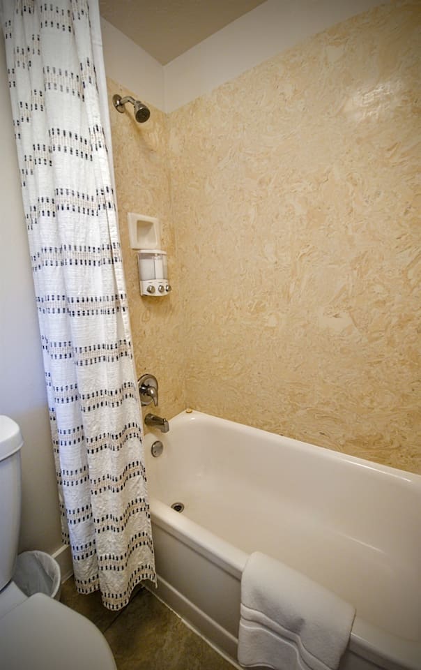 Full bathroom with bathtub