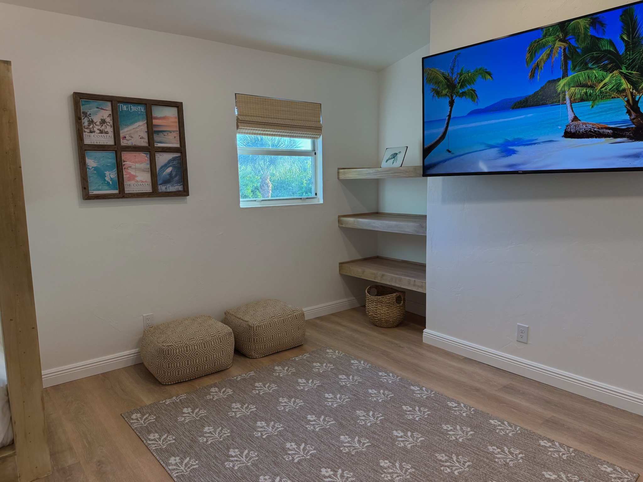 Spacious, airy bunk room with shelves to place your belongings and a 65” smart TV