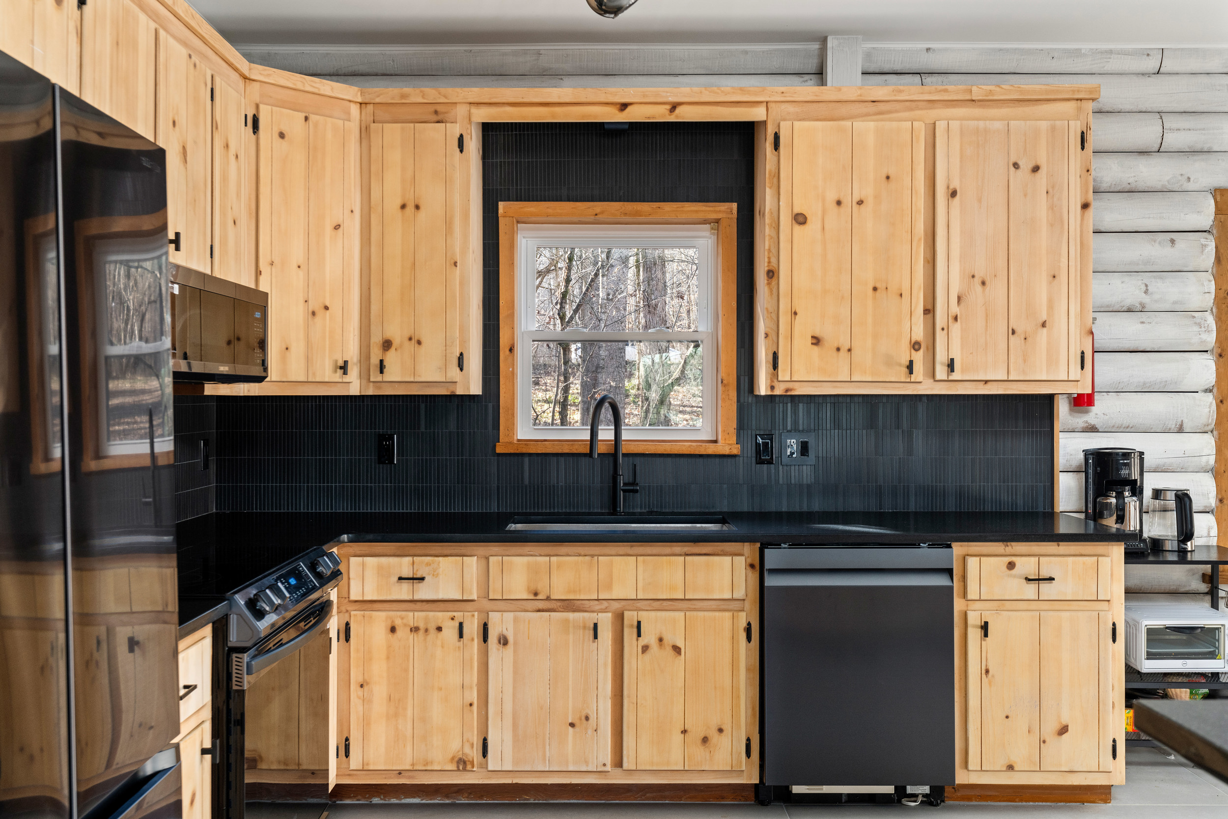 Kitchen: Bright and inviting space, perfect for culinary adventures with scenic views!