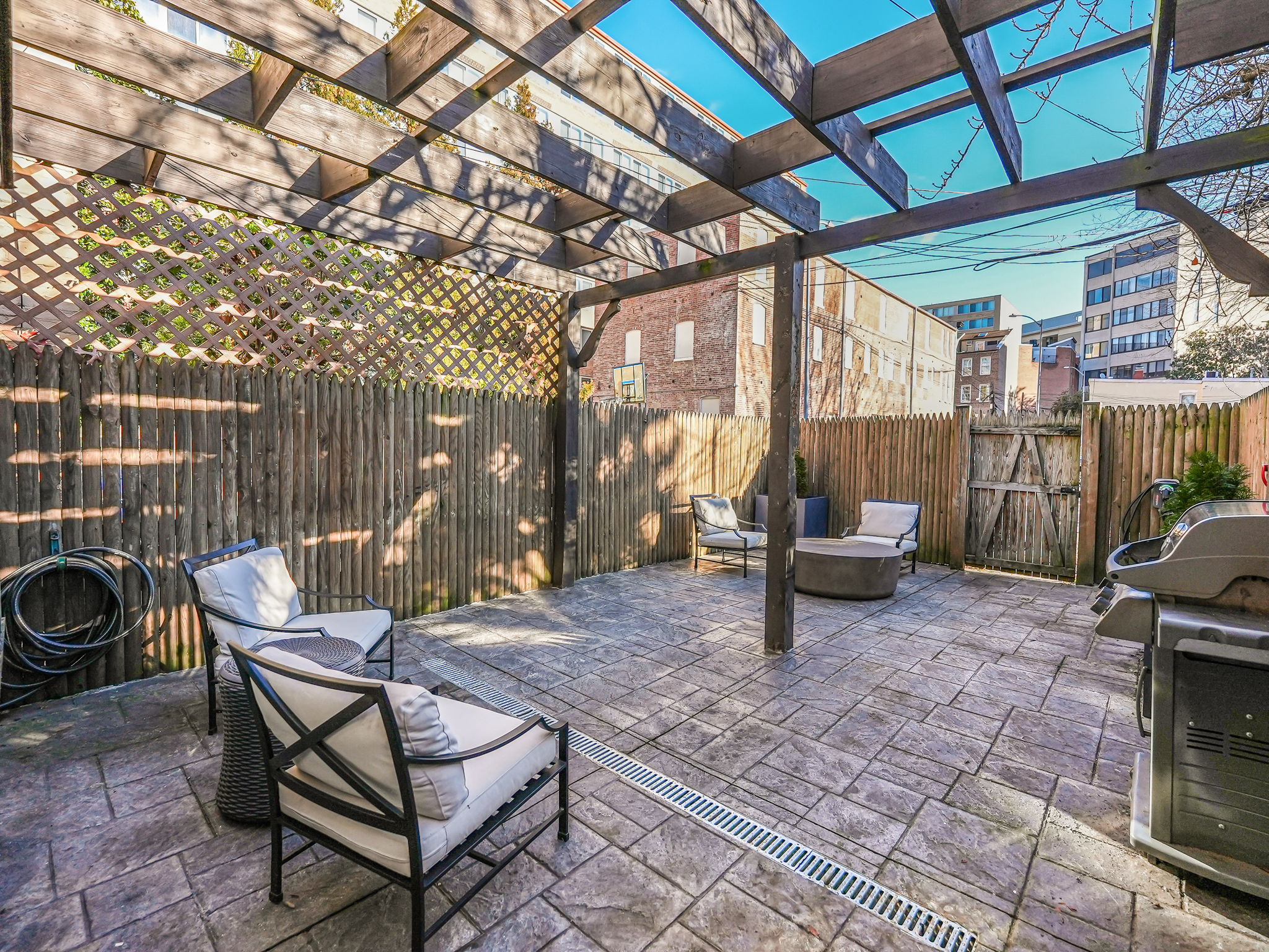 Private Rear Patio: Weber Grill, Restoration Hardware Seating & Table.