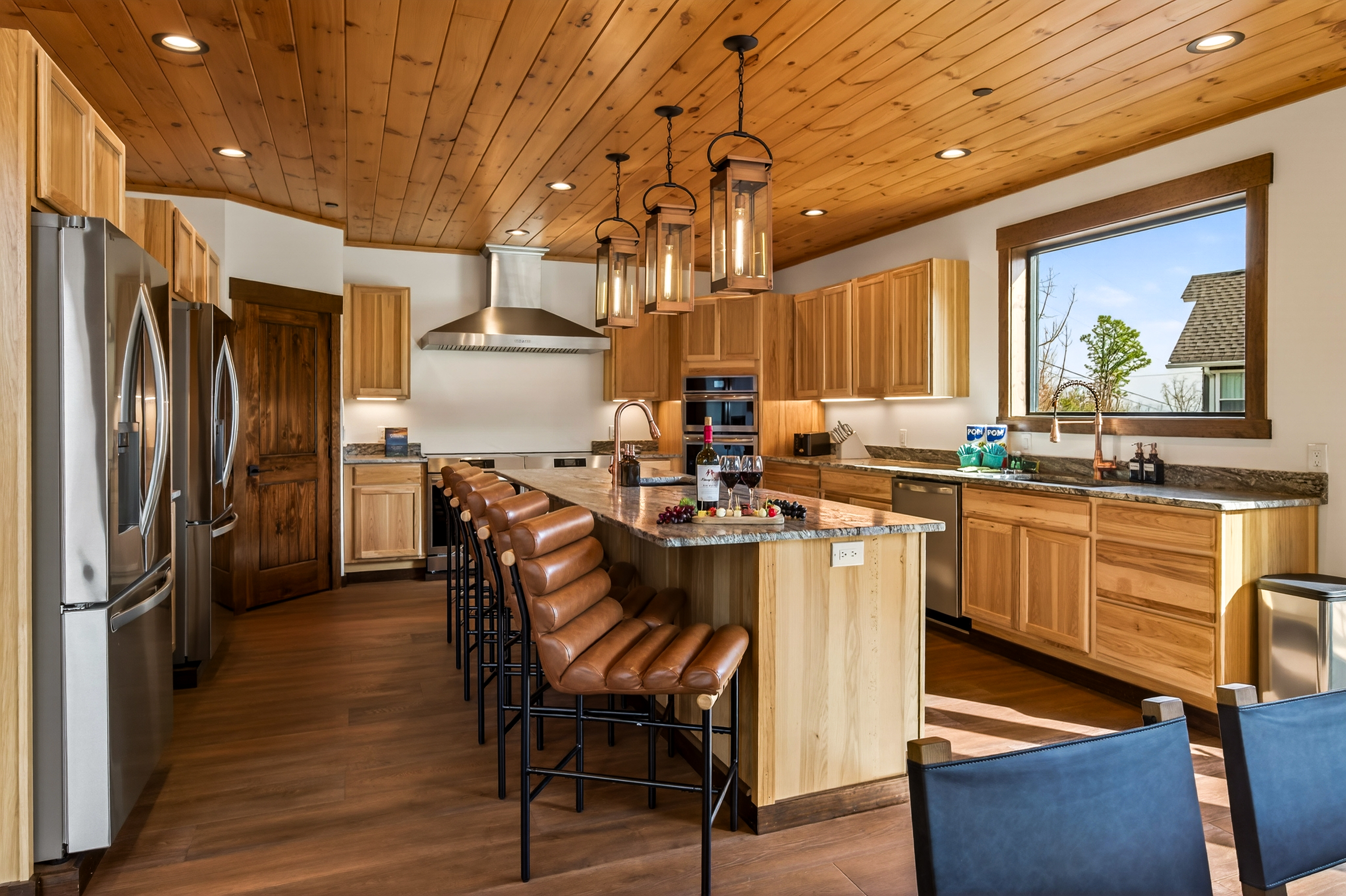 🍽️ Chef’s Kitchen– This fully stocked kitchen is designed for gathering & entertaining, featuring 2 full-size refrigerators, 4 ovens, 2 dishwashers, 2 microwaves & 2 sinks, plus a coffee bar. Perfect for preparing meals for the whole group.