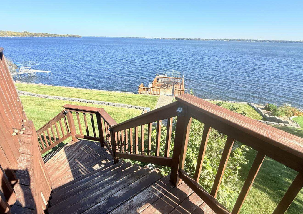 Stairs down to the lower patio area.