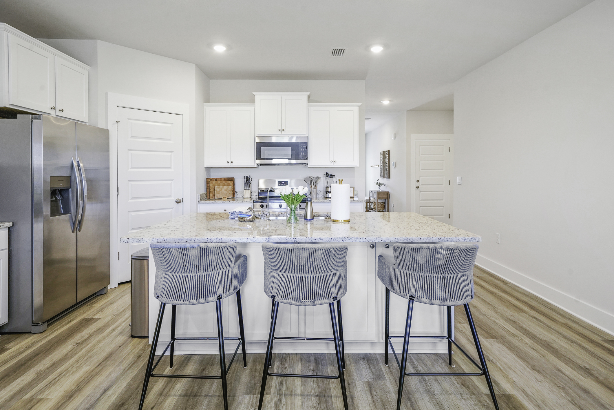 Gather around for meals and memories in this fully stocked kitchen space