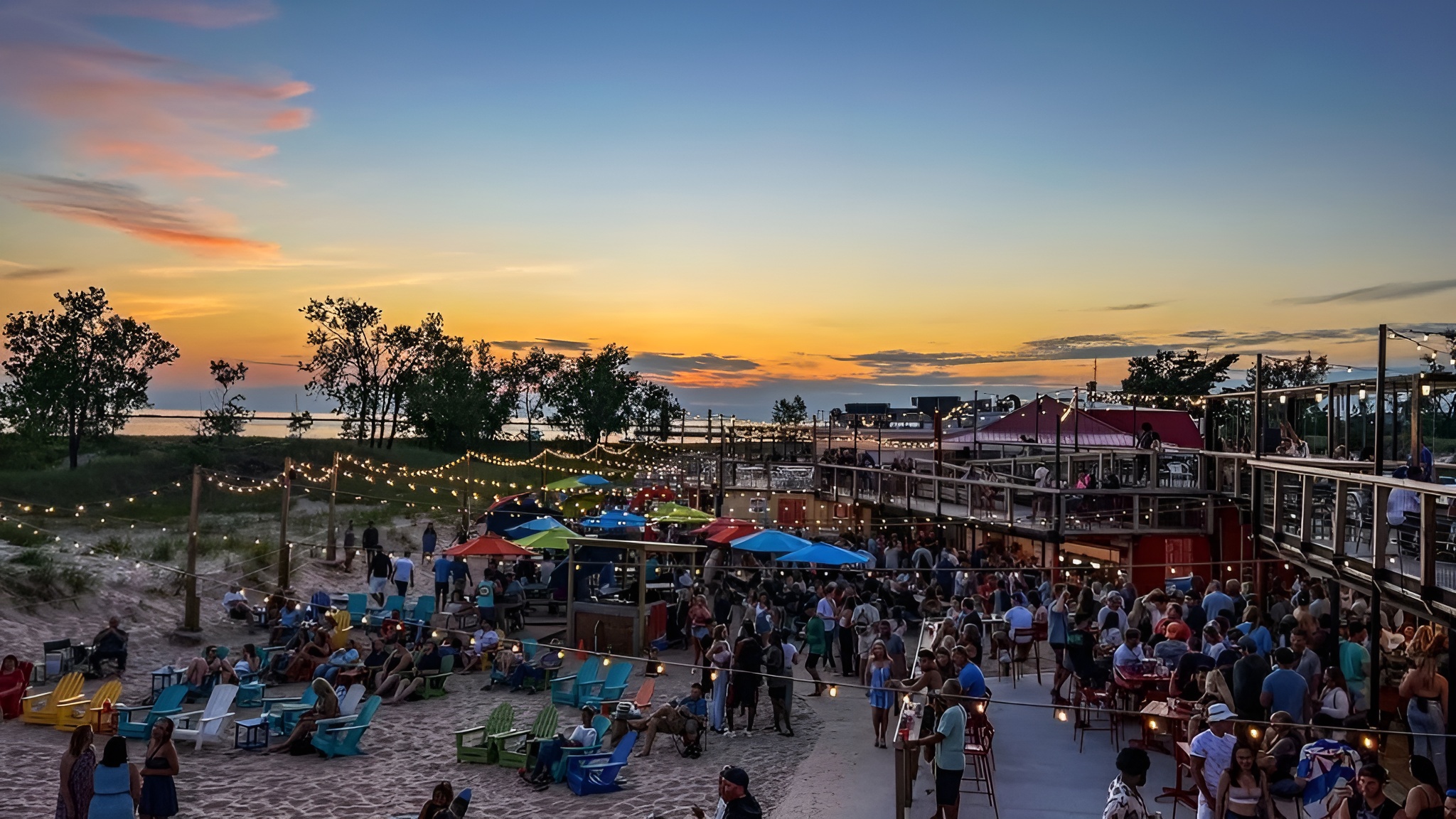 Grab food and drinks right on the sand at The Deck - Muskegon’s favorite beachside hangout