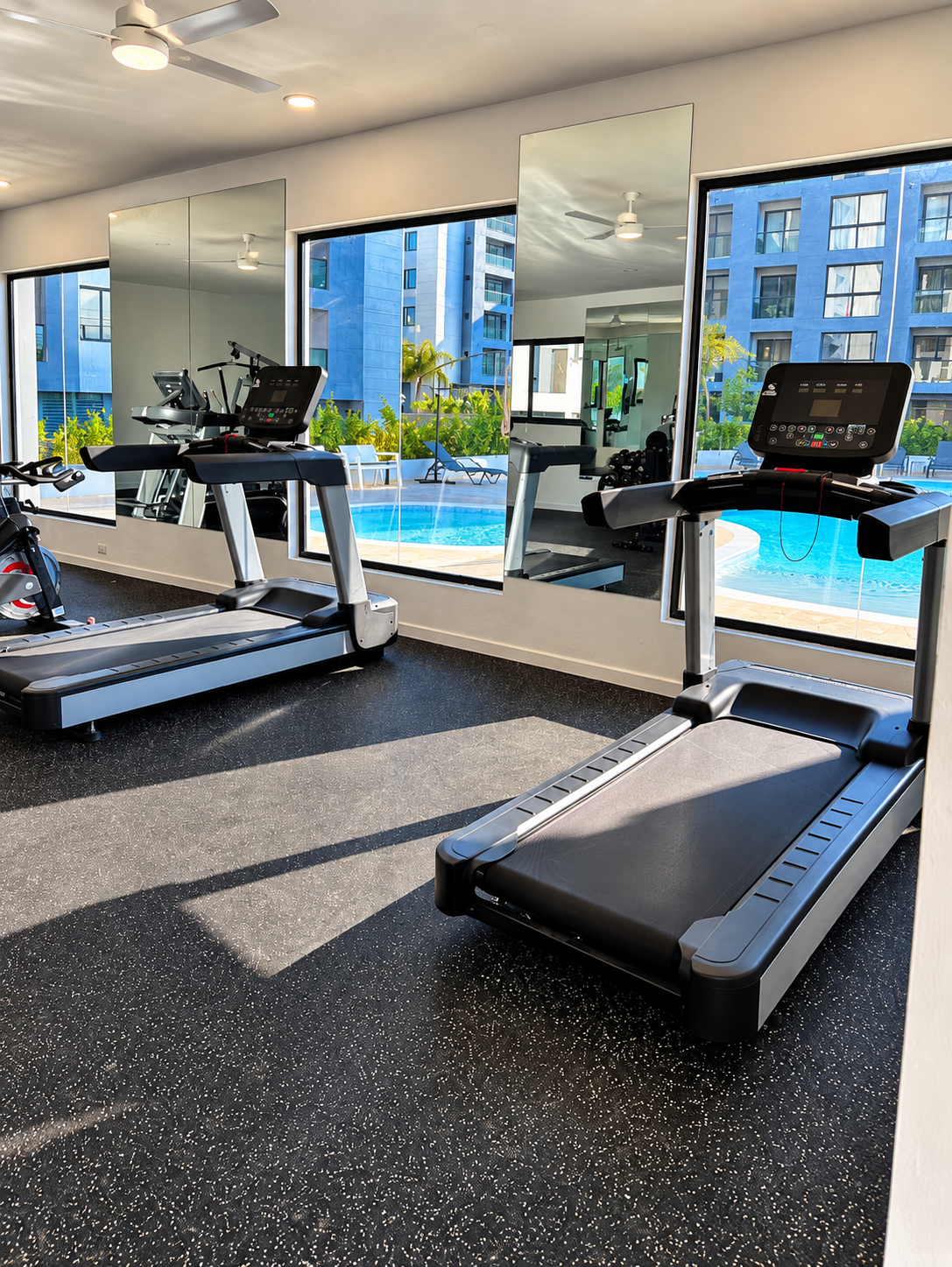 Stay active during your stay with access to the community fitness center. 💪🏽✨