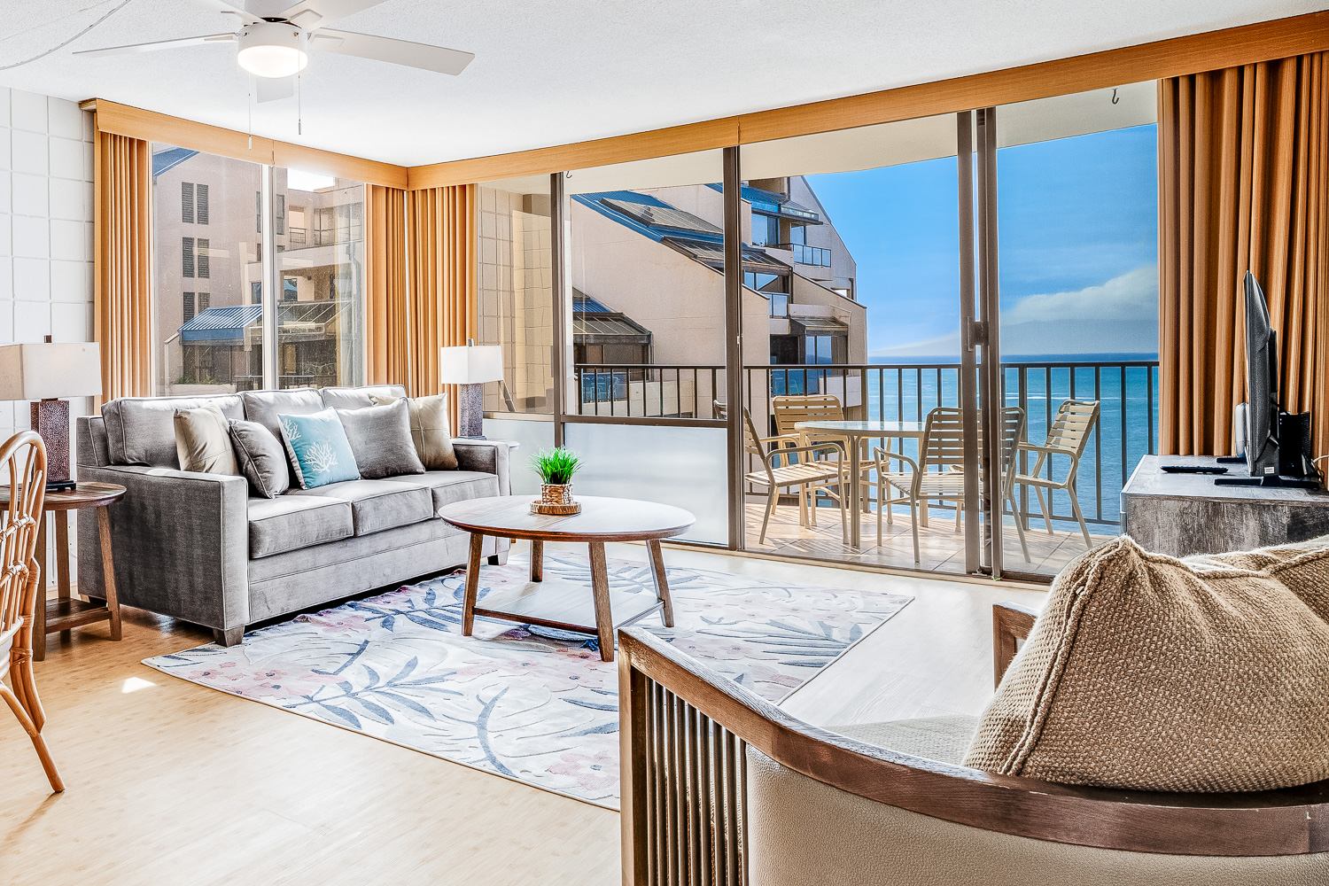 Spacious ocean view living room with sleeper sofa