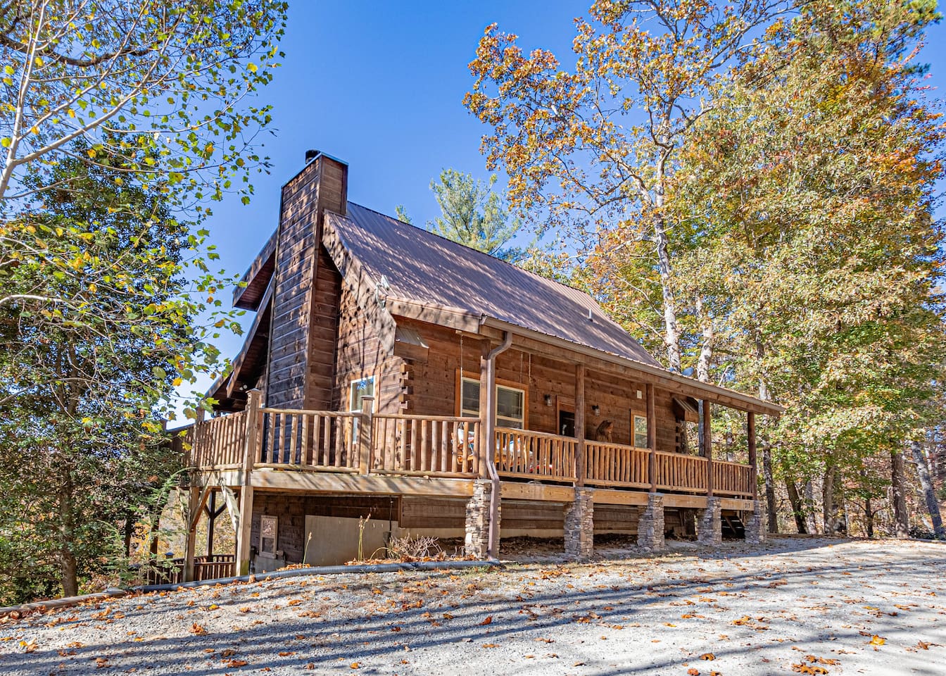 Private 3 level 4 bedroom/ 3 bath log cabin overlooking river with mountain views.