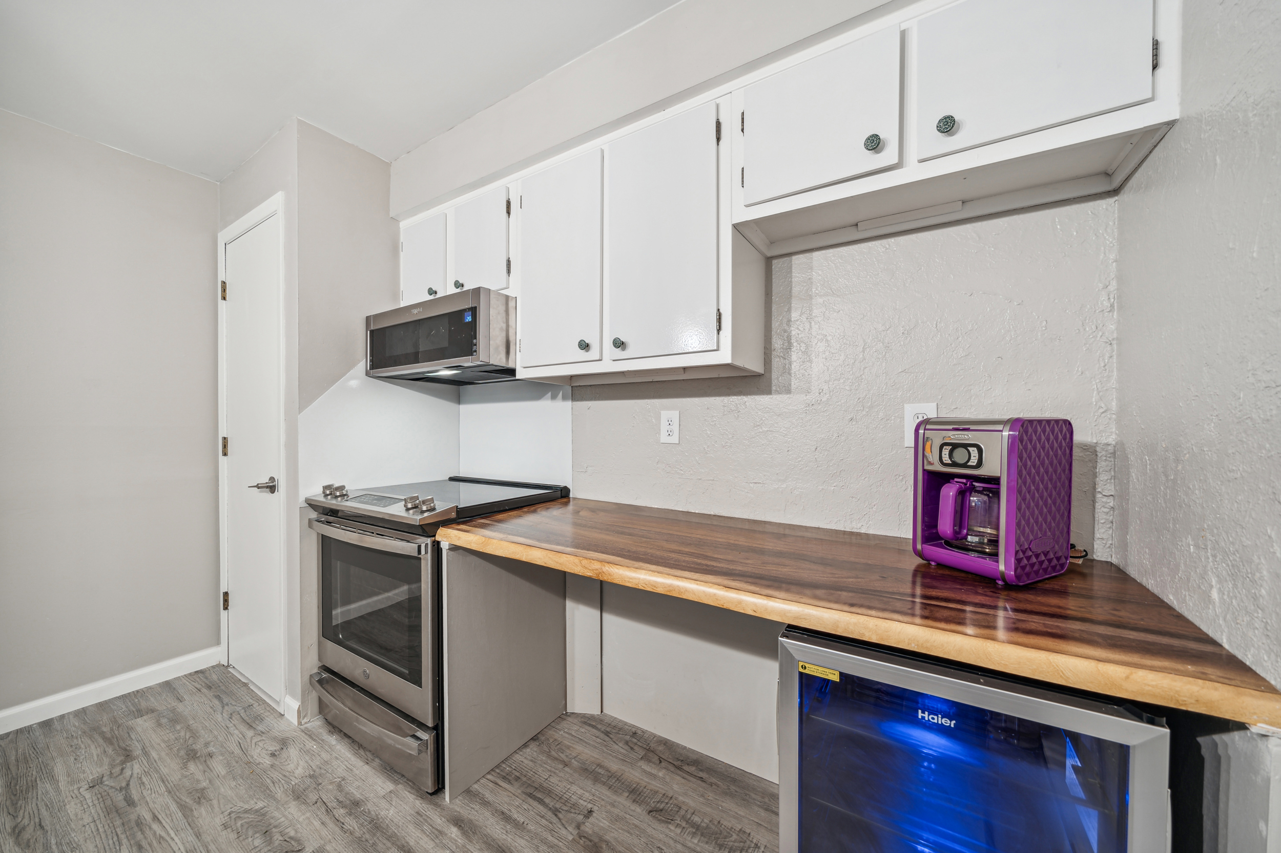 The lower kitchen features a 30 plus inch work space with 34" counter height for greater accessibility. There is an accessible mini-fridge under the counter.