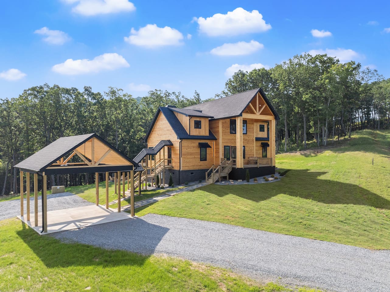 Nestled on a spacious lot, this image shows off the home’s placement in peaceful, wooded surroundings.