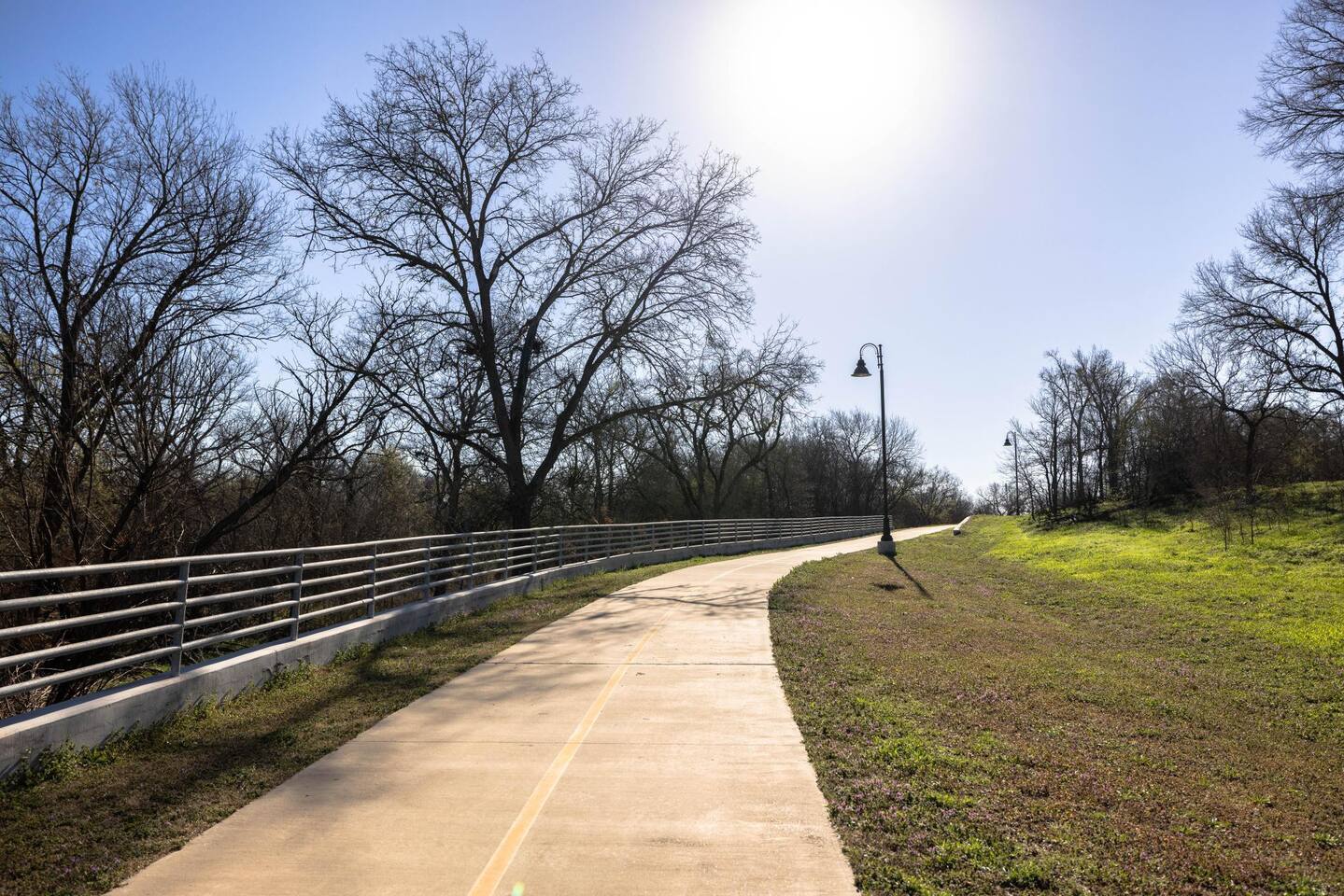 Enjoy direct access to the scenic Bosque River Trail from the backyard, perfect for nature walks or bike rides.
