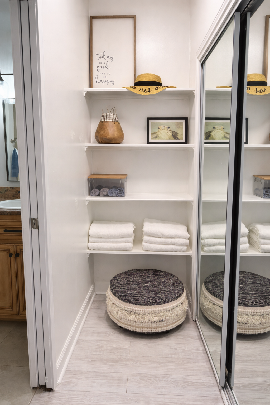 Thoughtfully organized linen closet with plush towels