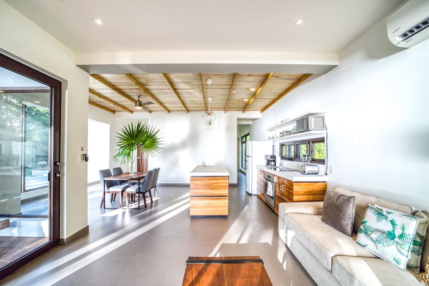 View  of kitchen and passageway to the bedrooms from the living room