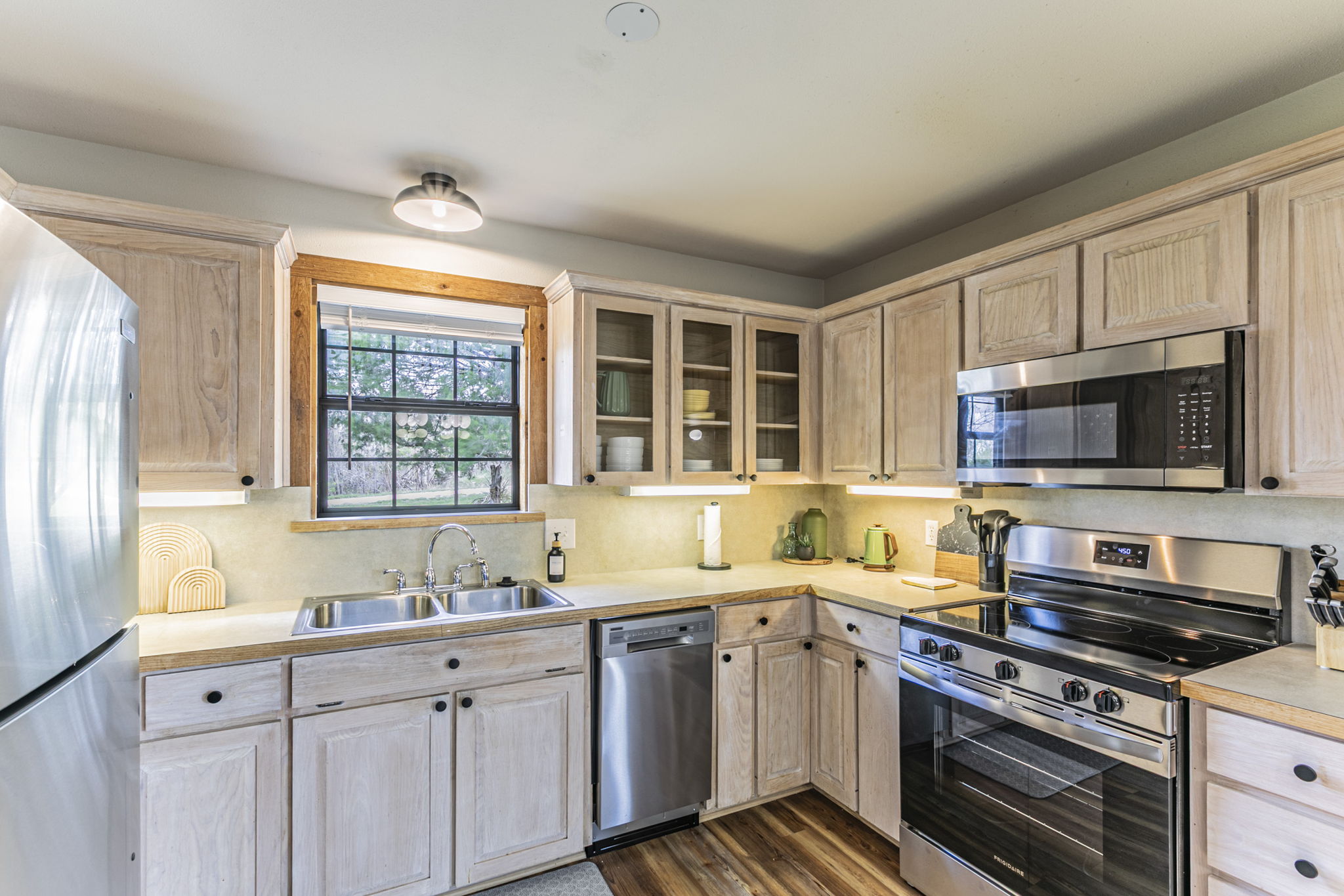 Stocked kitchen with new appliances.