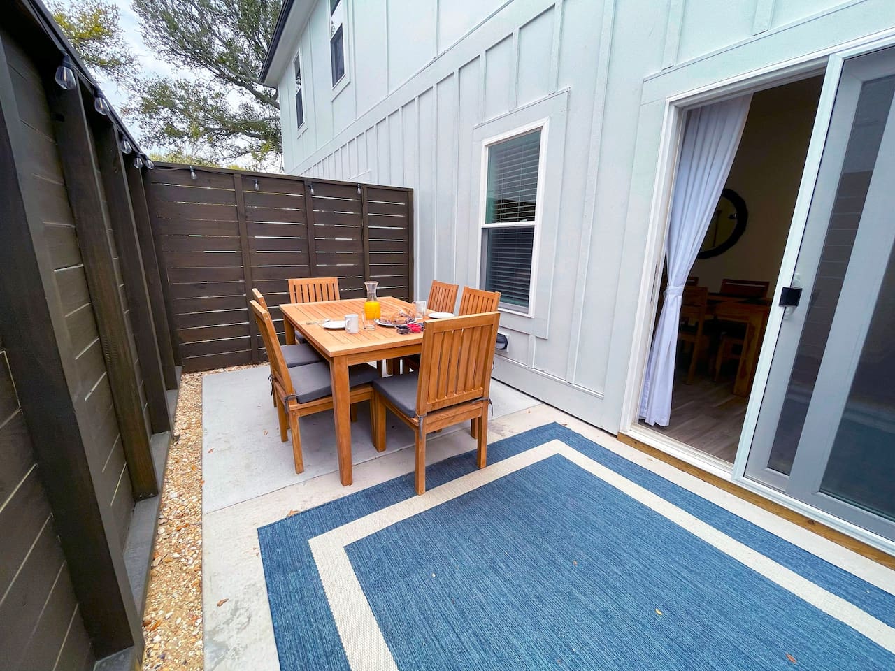 Outdoor patio with gas grill.