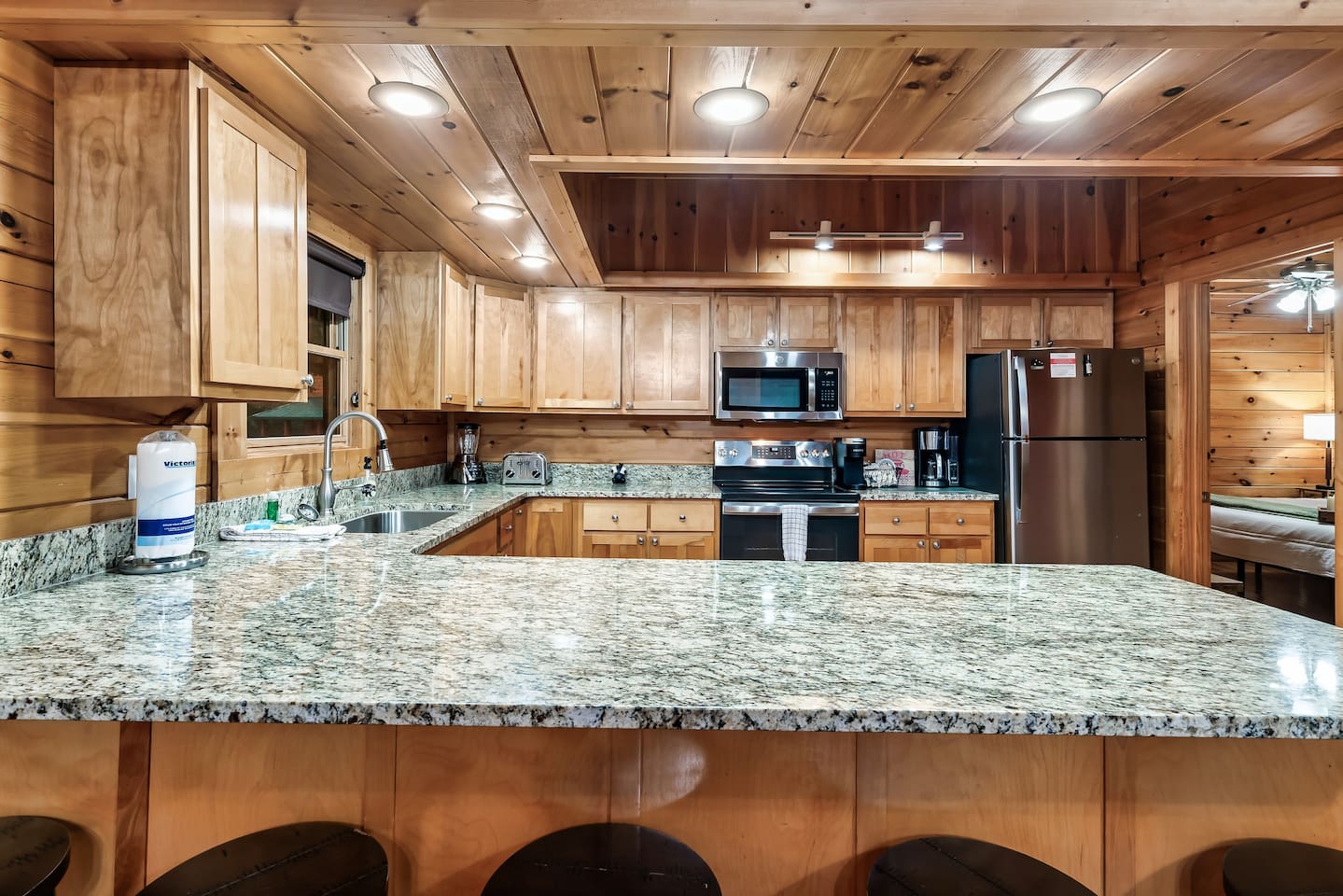 Kitchen with view of Main Level King Suite