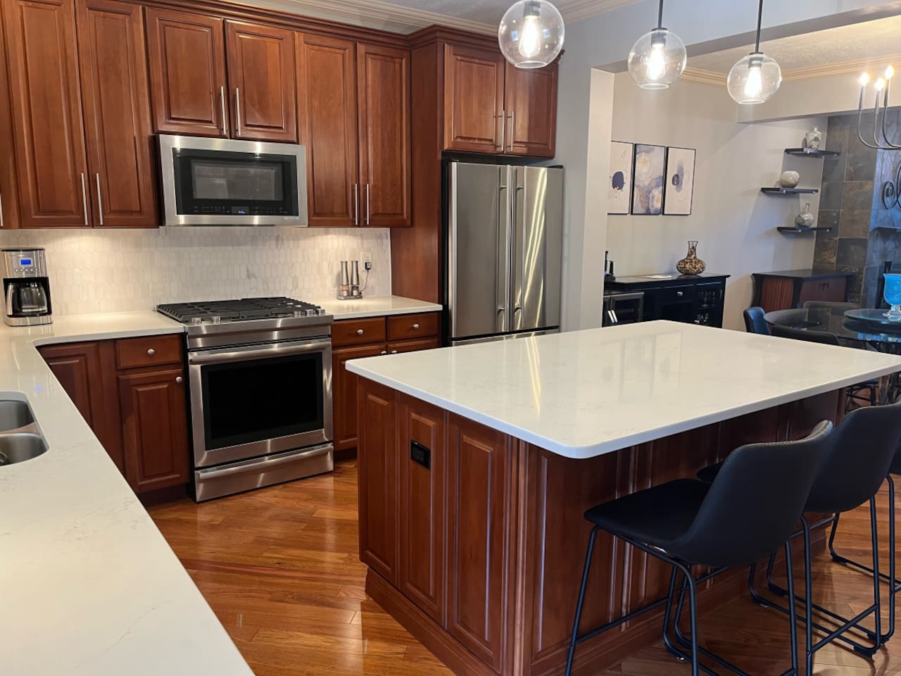 Elegant kitchen featuring sleek cabinetry, modern appliances, and stylish finishes, creating a perfect space for cooking and entertaining.