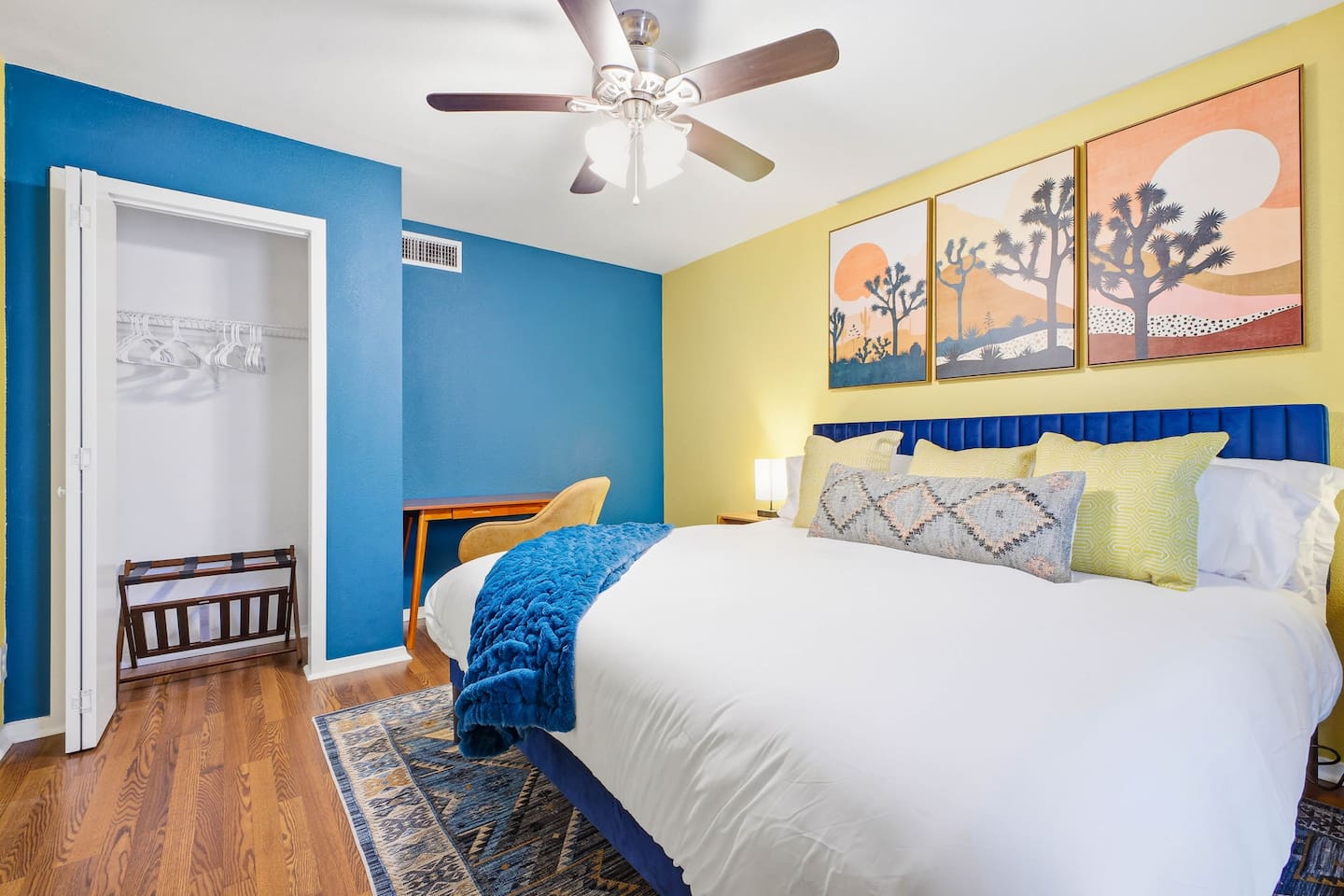 First-floor bedroom with king bed and Roku TV, convenient working space  