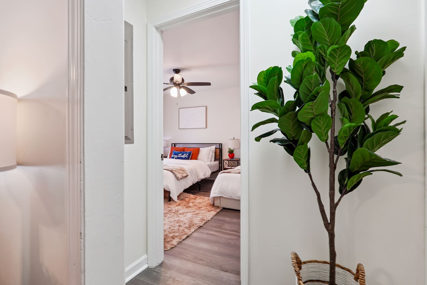 Showcases Bedroom #2 to the left of the hallway.