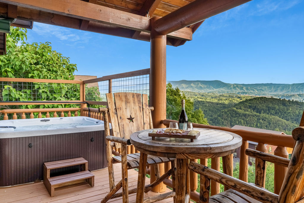Enjoy a glass of wine on the deck as the sun sets behind the Smoky Mountains.