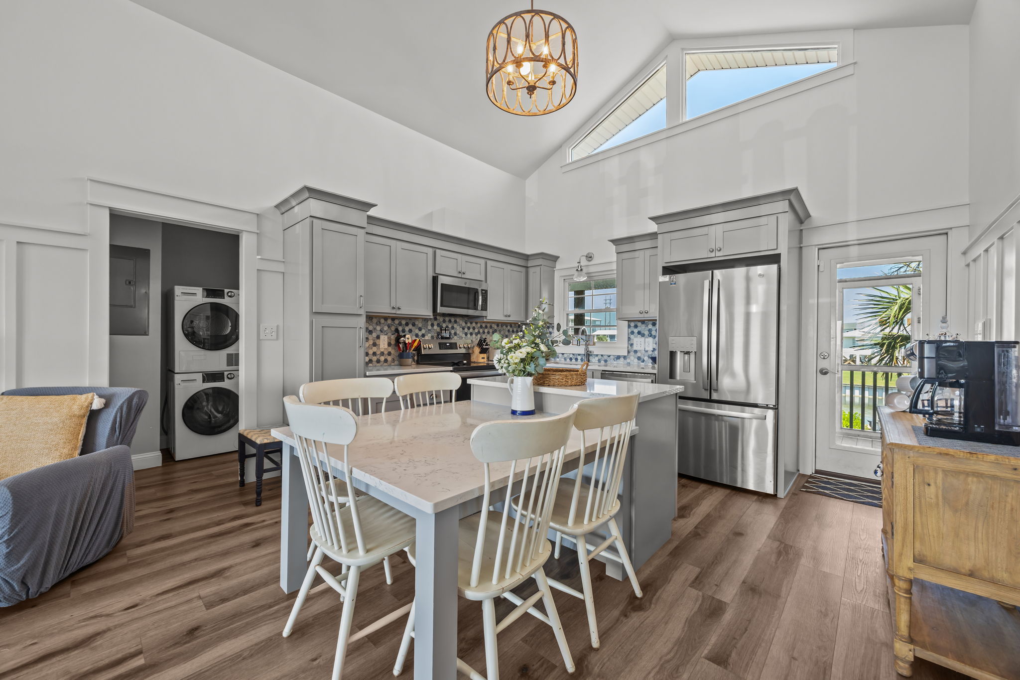 Fully equipped kitchen featuring updated stainless-steel appliances.