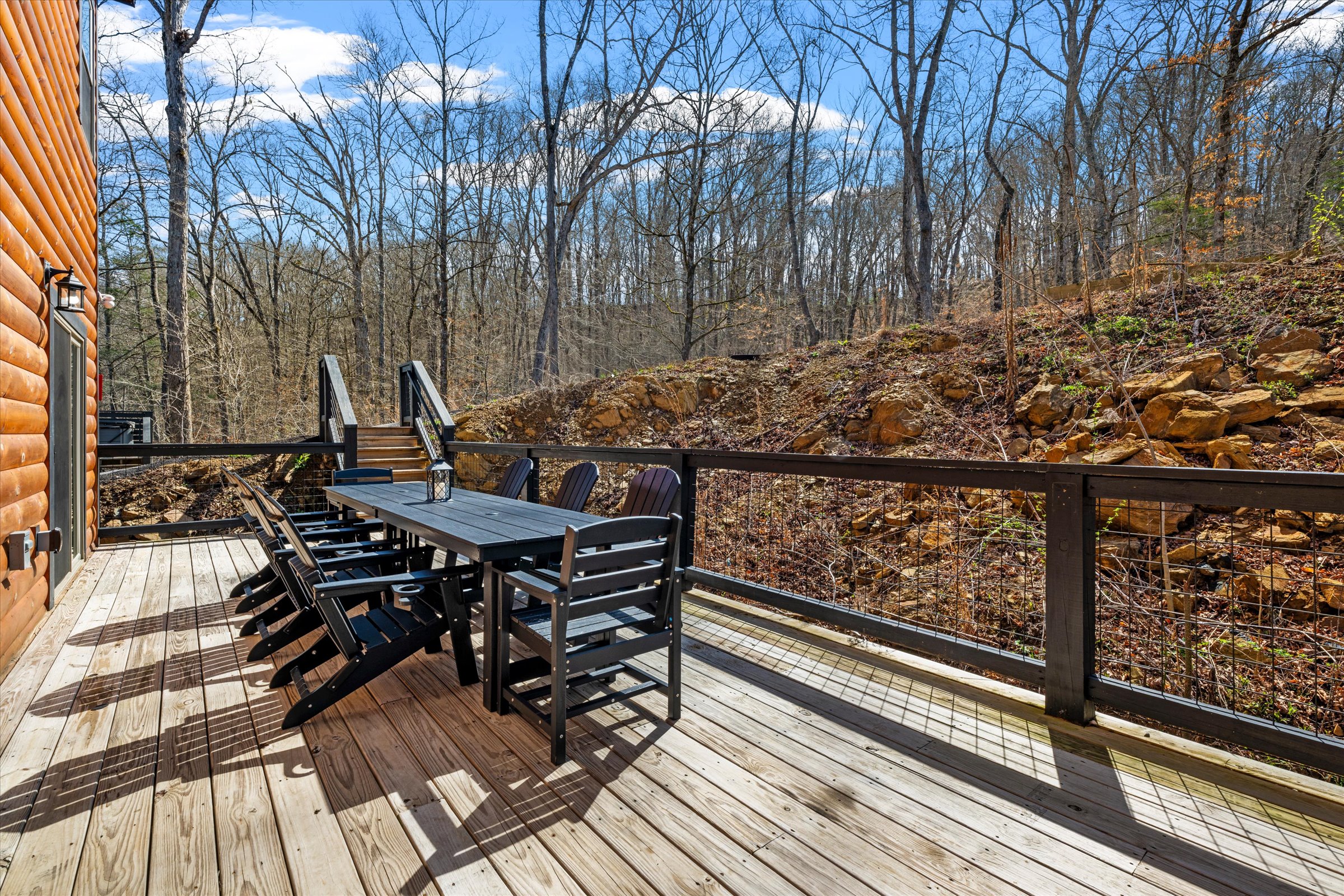 The large outdoor dining set provides plenty of room for the whole family to gather.